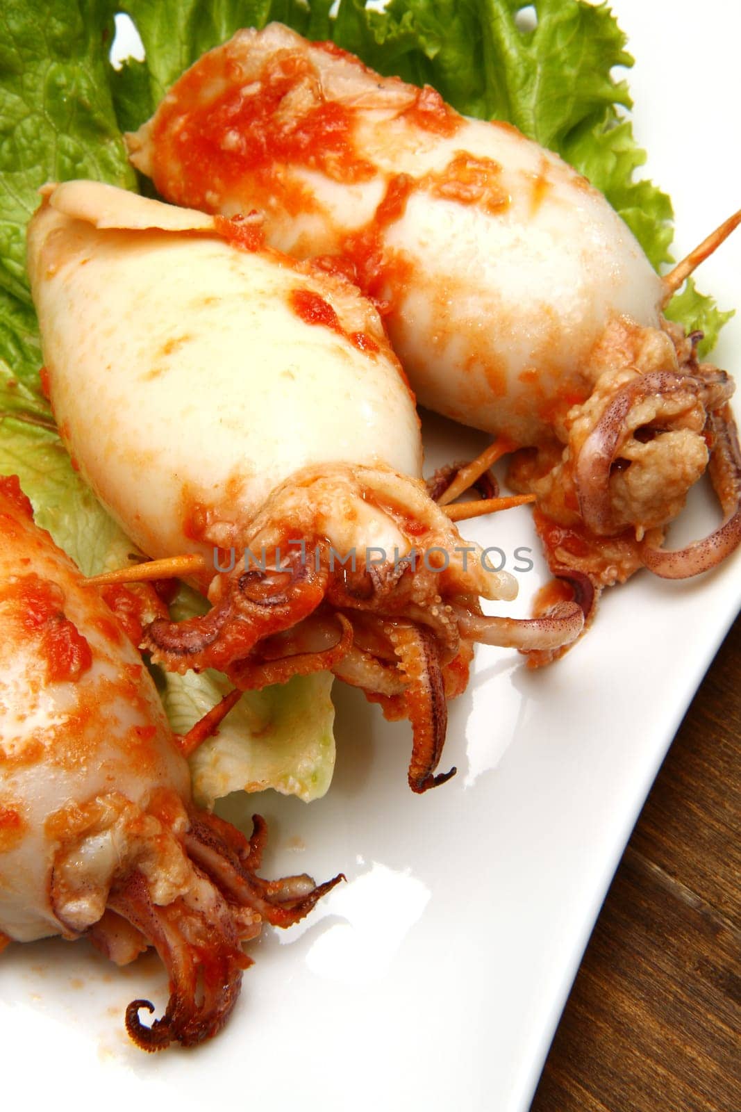 calamaru with tomatoes