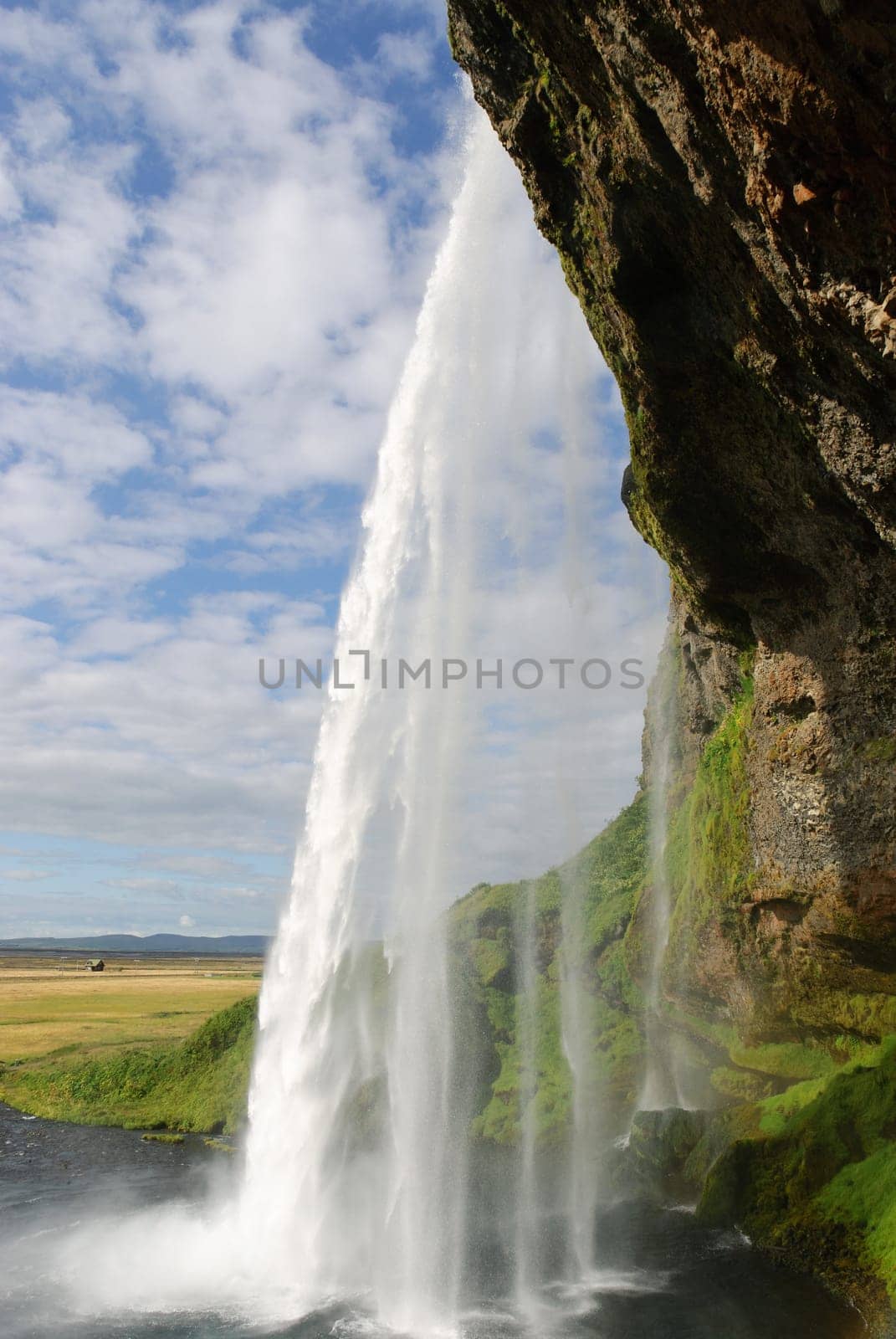 rear view of the waterfall seljalandsfoss