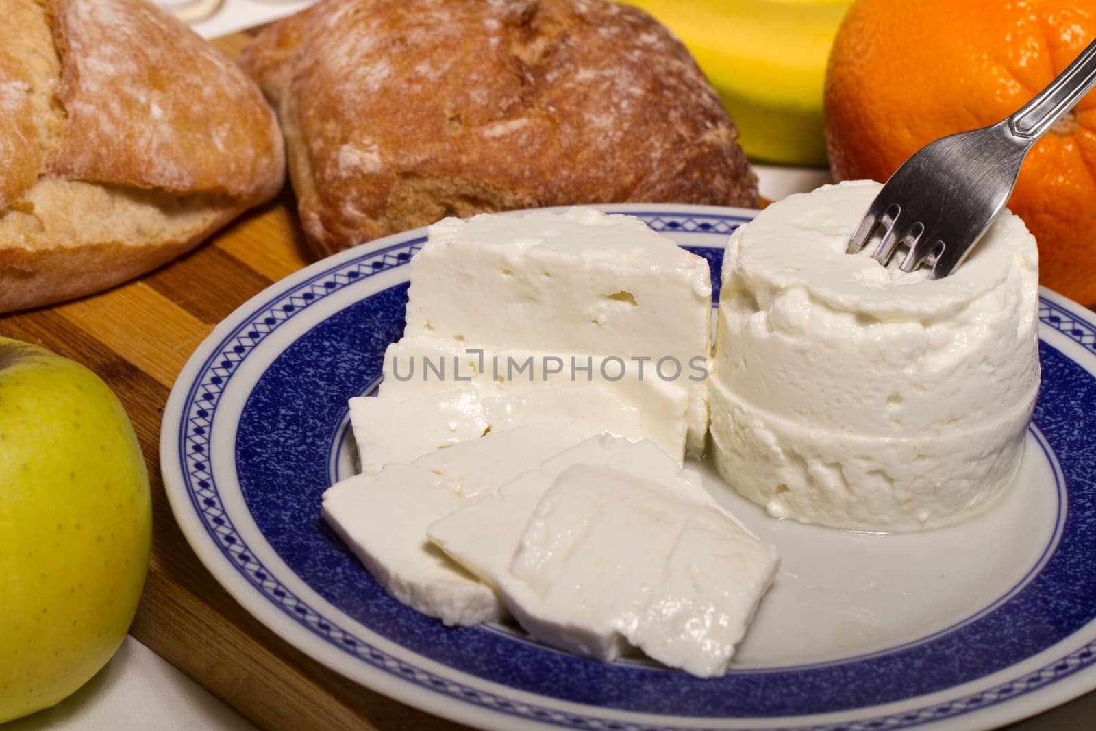 View of a dish of fresh cheese on a plate.