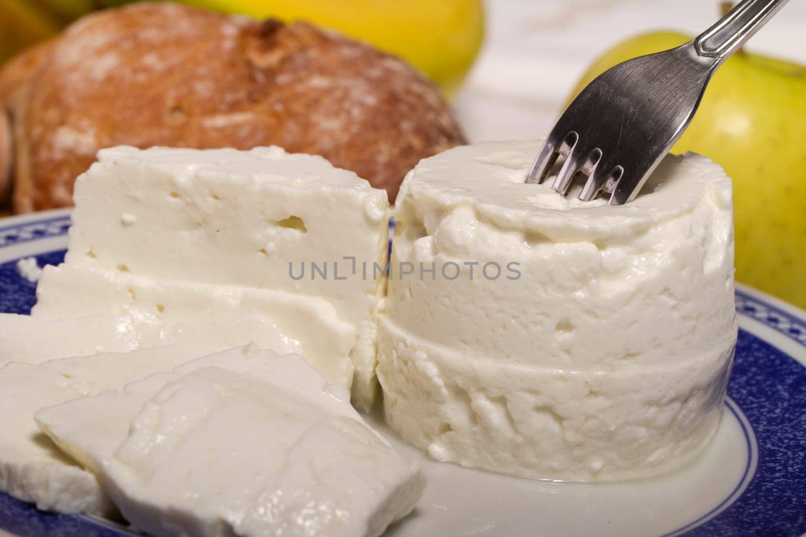 View of a dish of fresh cheese on a plate.
