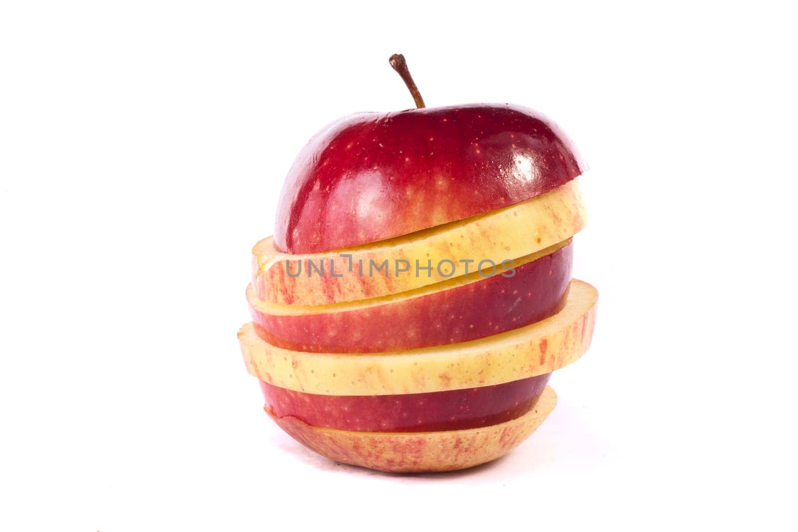 Close up view of some red apples isolated on a white background.