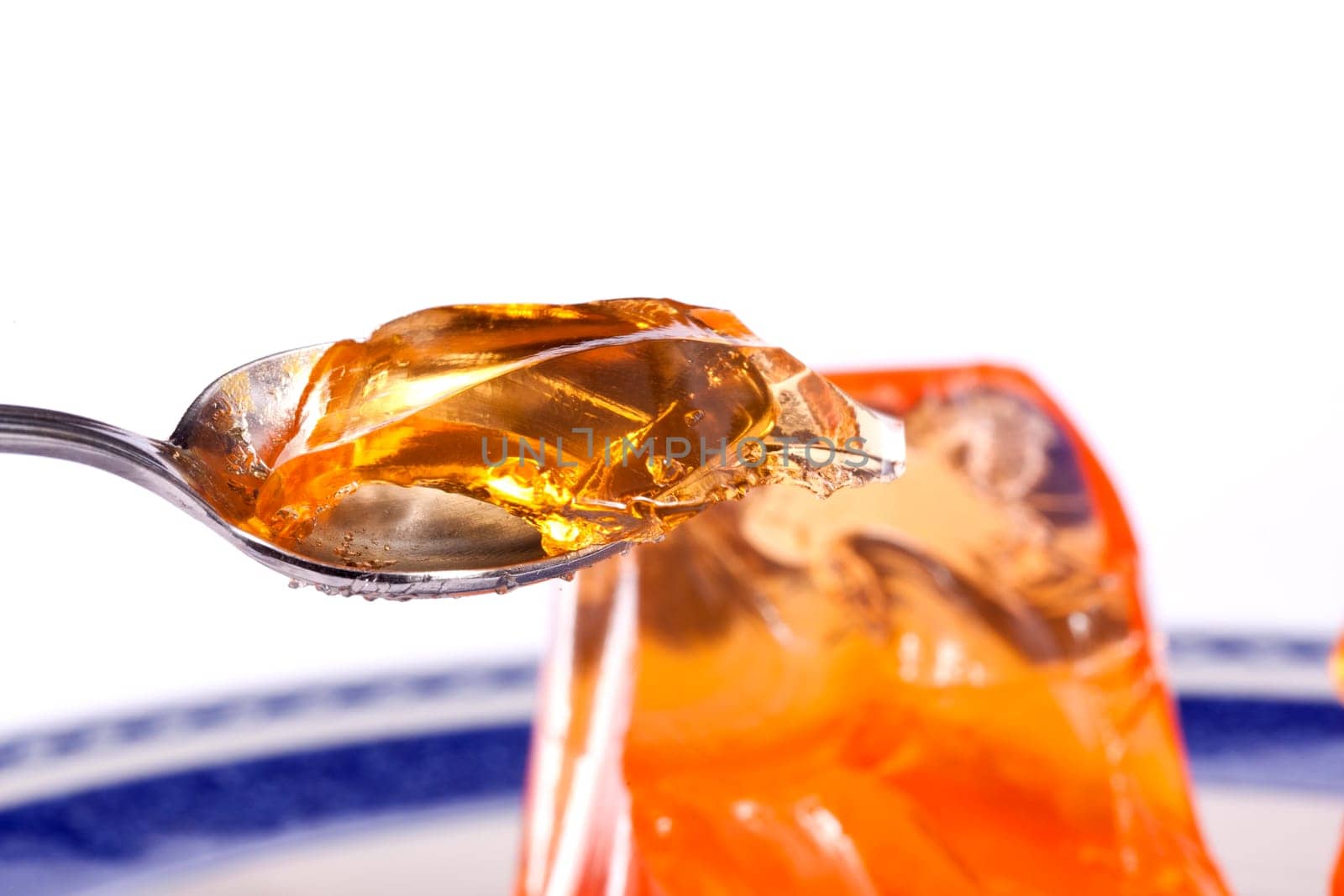 Close up view of  a orange gelatin isolated on a white background.