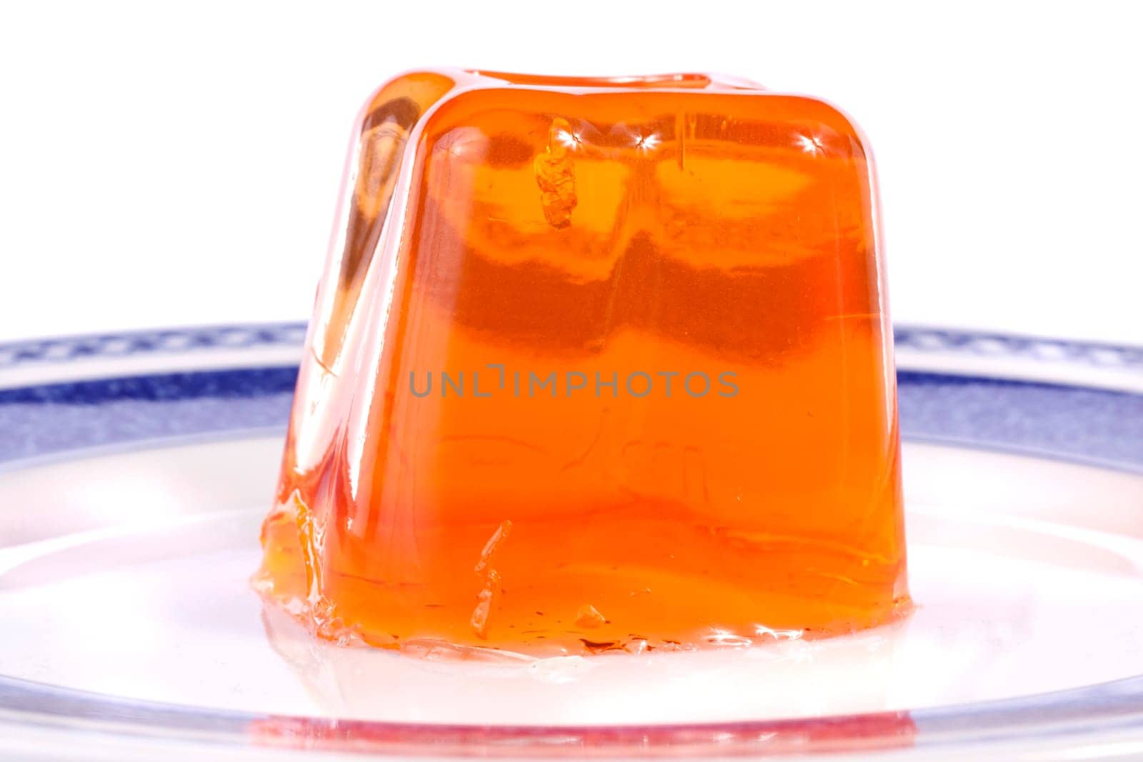 Close up view of  a orange gelatin isolated on a white background.