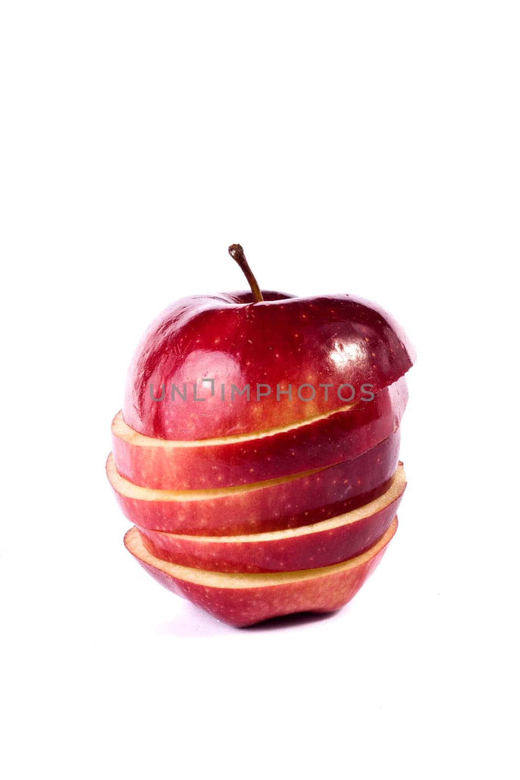 Close up view of some red apples isolated on a white background.