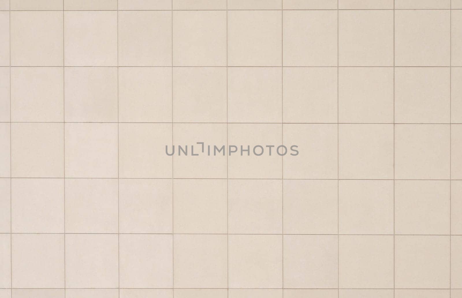 Beige tiled wall, perfect as a background