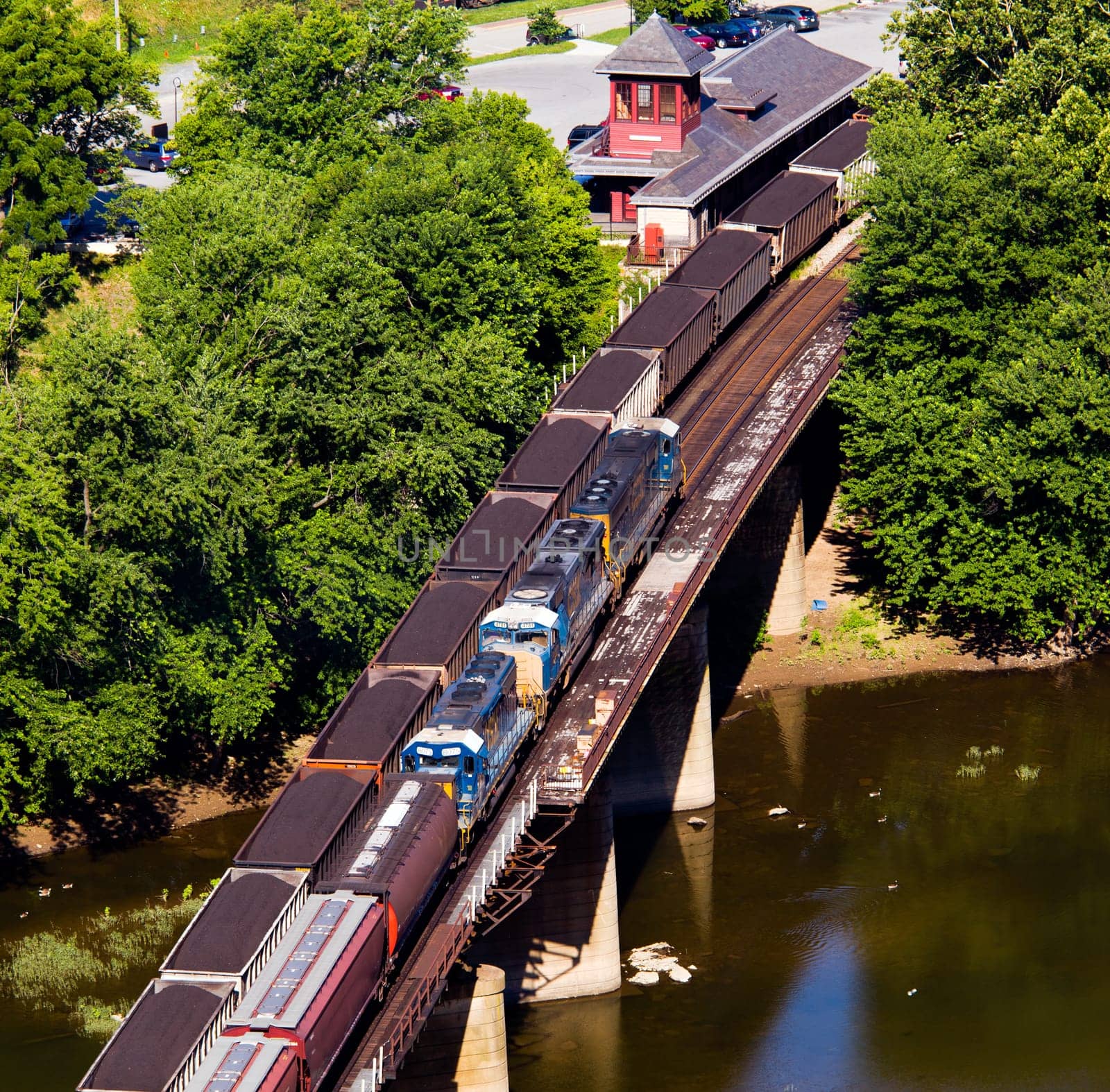 Aerial view over the National Park town of Harpers Ferry in West Virginia with railway station and freight trains
