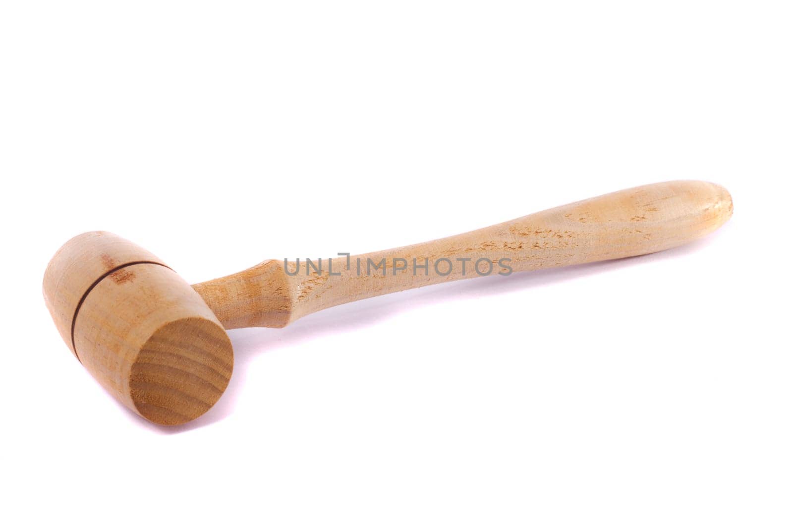 Close view detail of a small wooden kitchen hammer isolated on a white background.