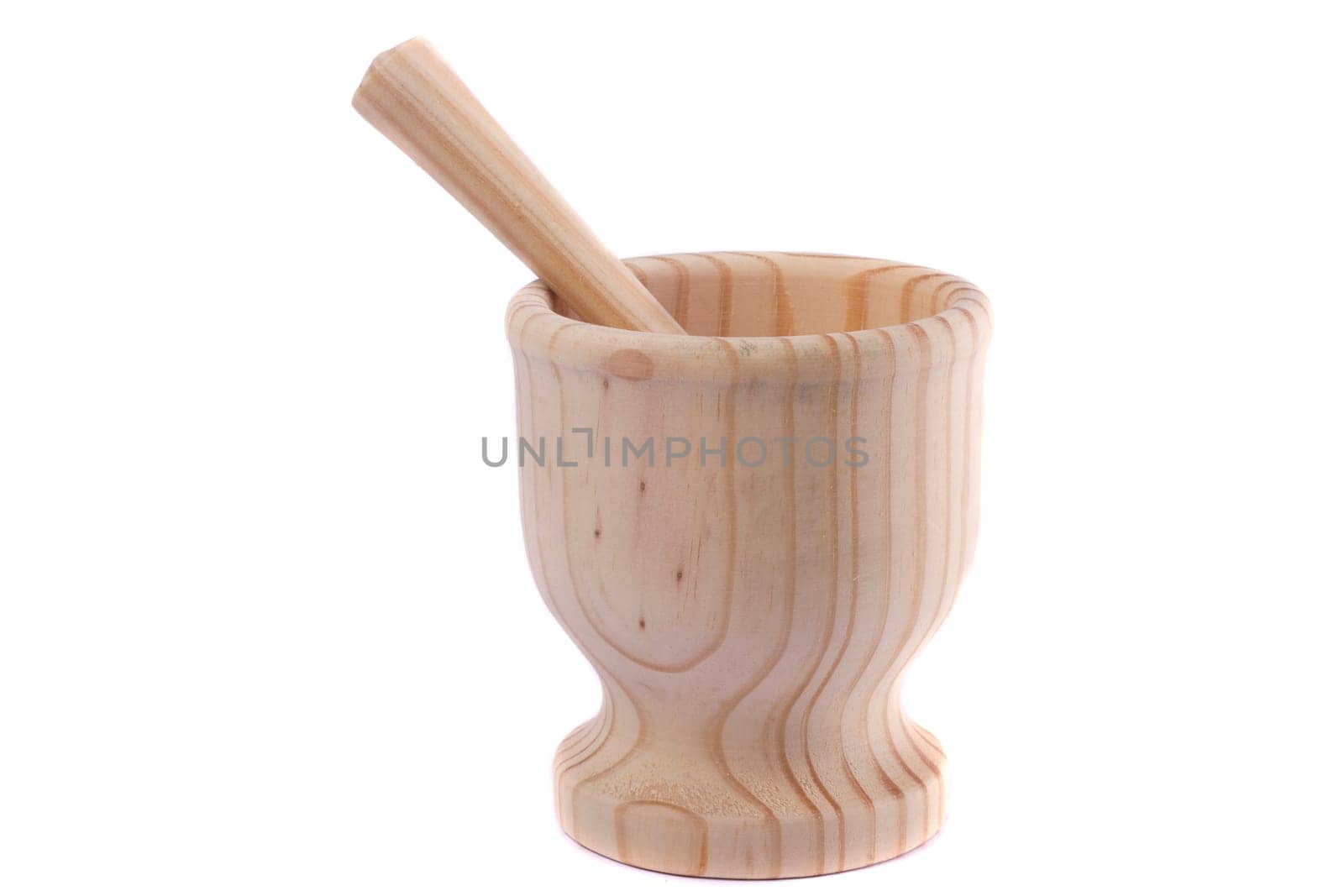 Close up view detail of a wooden garlic smasher isolated on a white background.