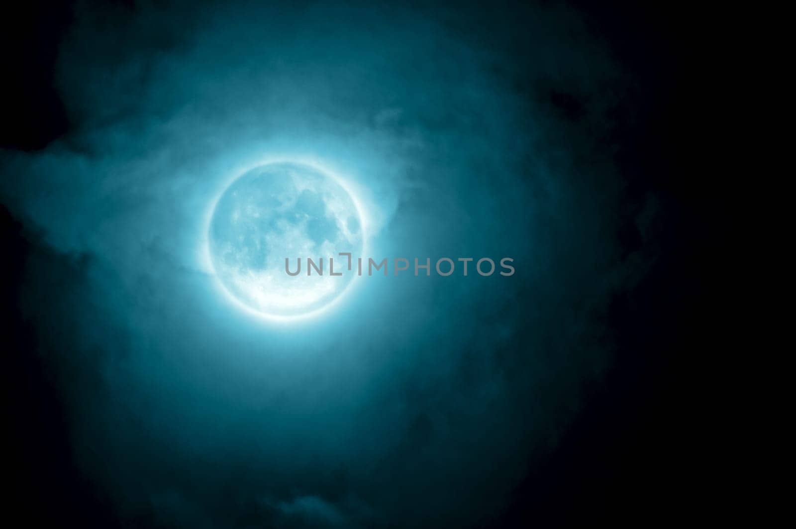 Glowing Moon Close-up on Dakb Blue Sky