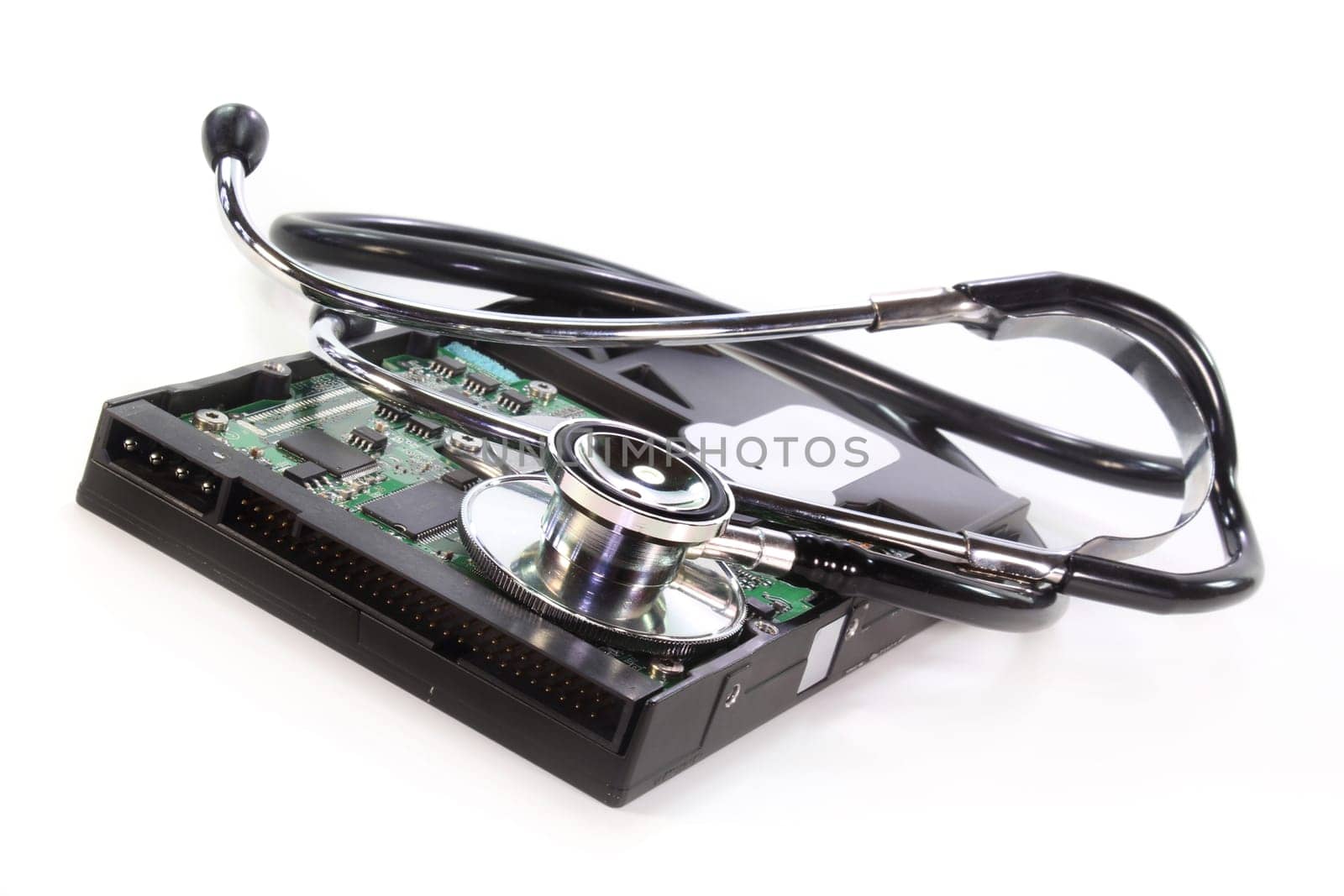 a hard drive and stethoscope voe white background