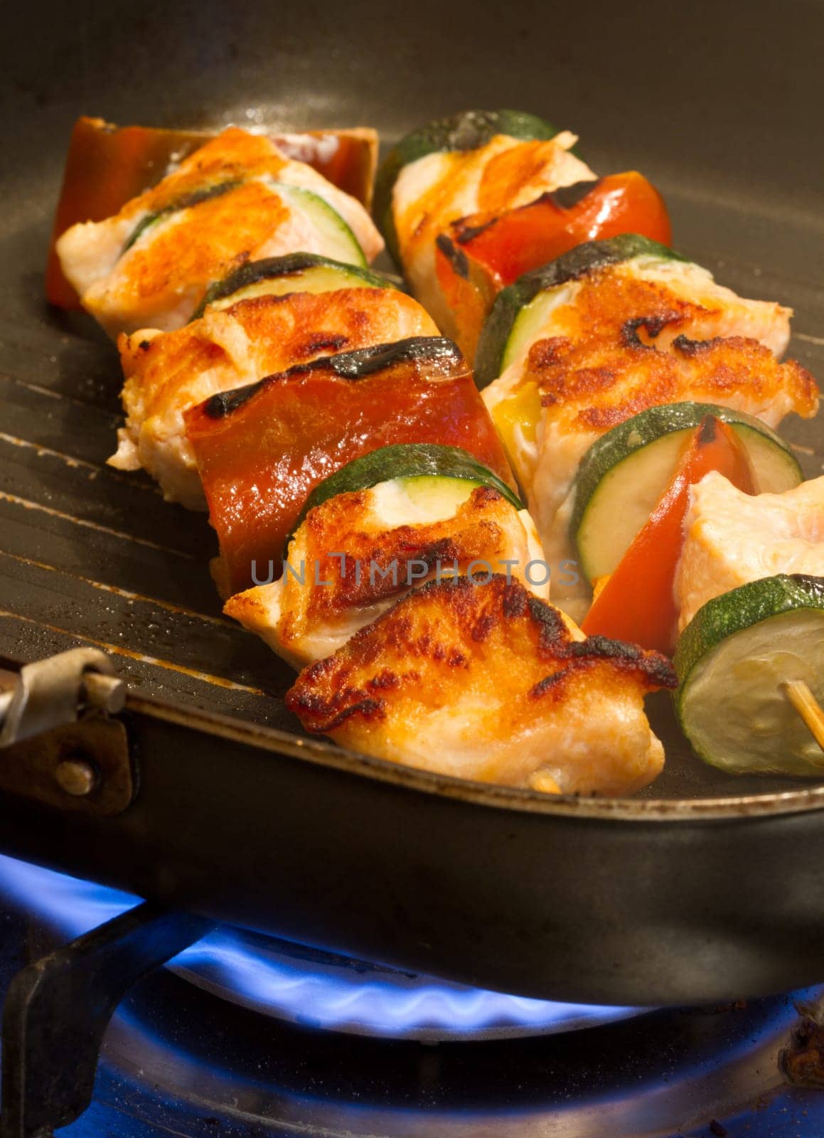 salmon kebab with zucchini and peppers