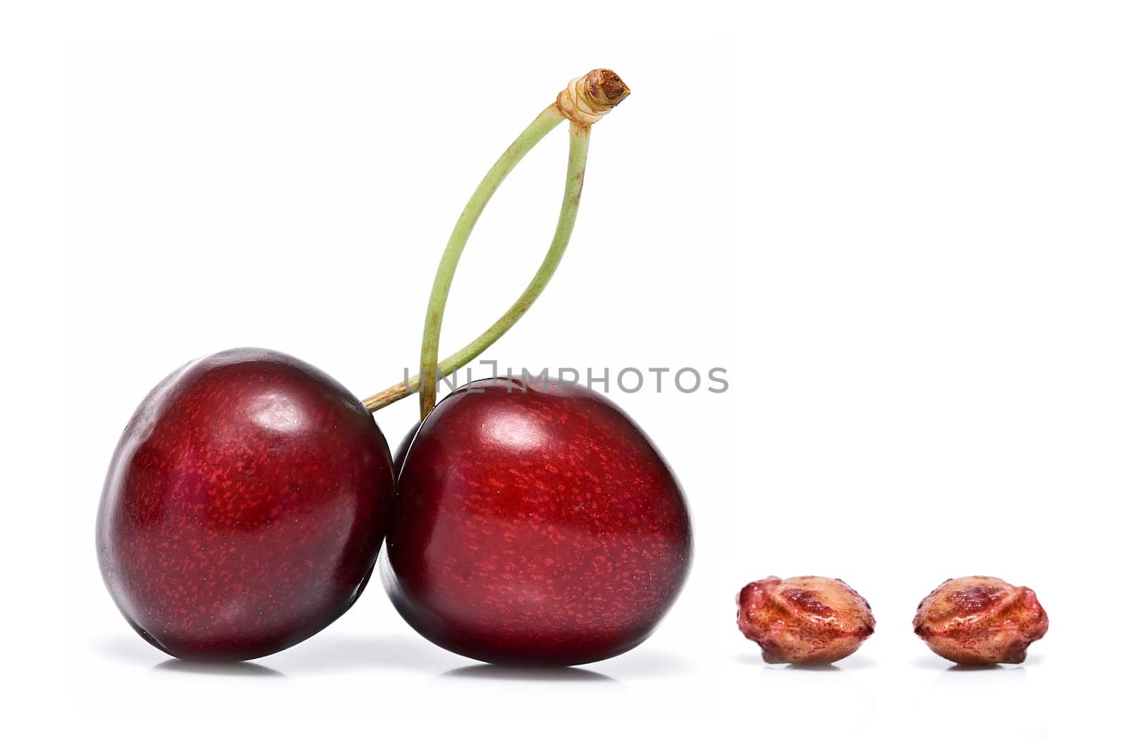 Fresh cherries isolated on a white background.