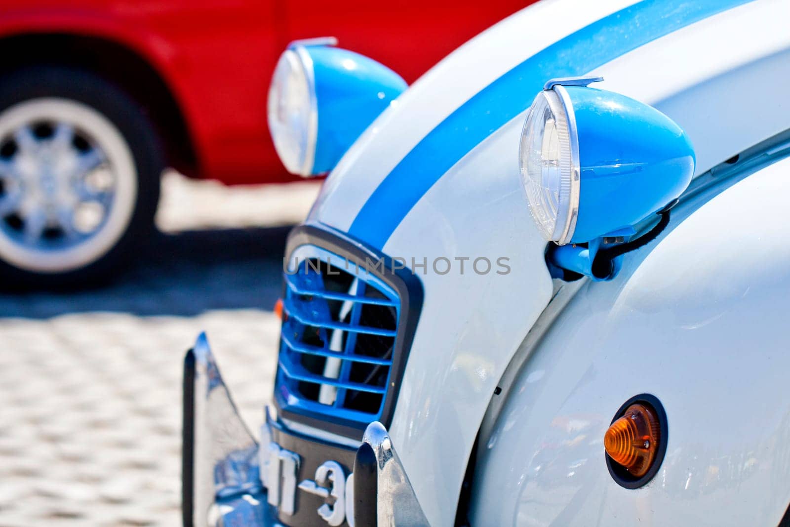 Close view of the front detail of a French classic car.