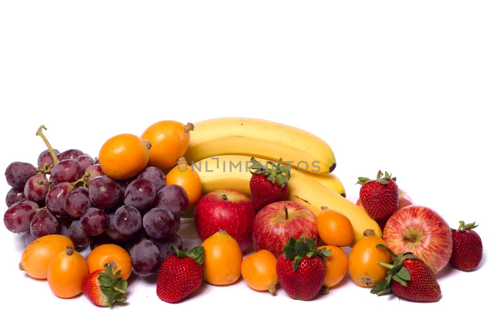 Close up view of a mix of several fruits isolated on a white background.