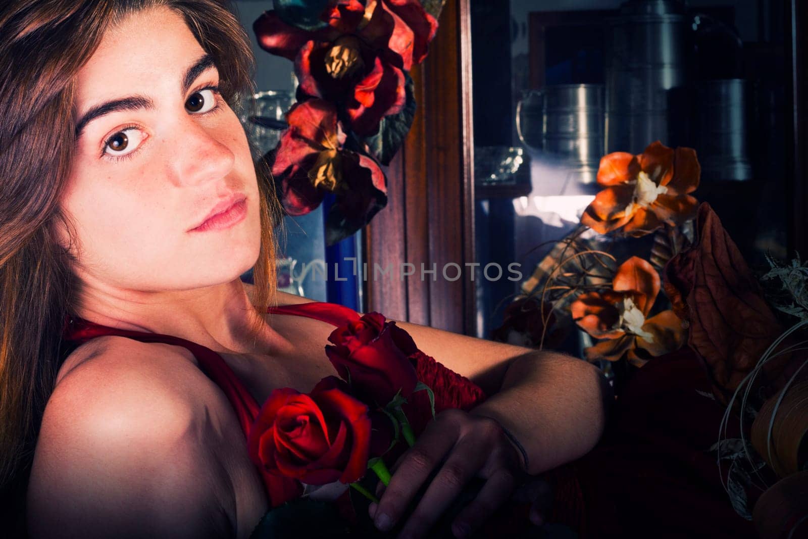 View of a beautiful young girl in a red dress on a living room.