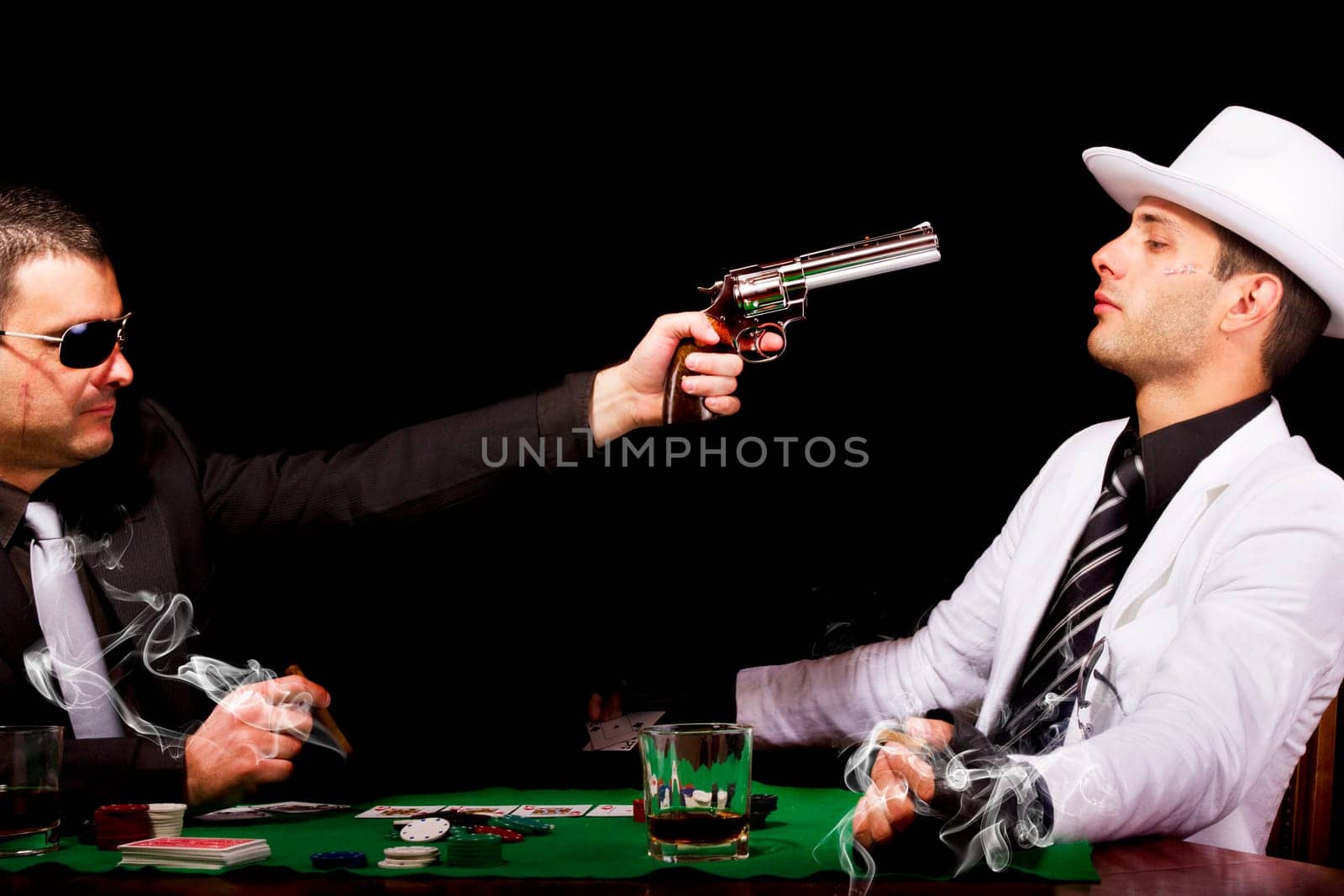 View of two gangster males having a serious discussion.