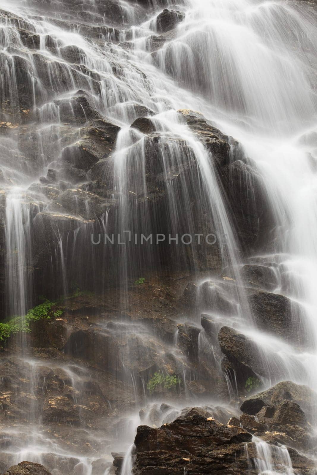texture of flowing water on a stone mountain
