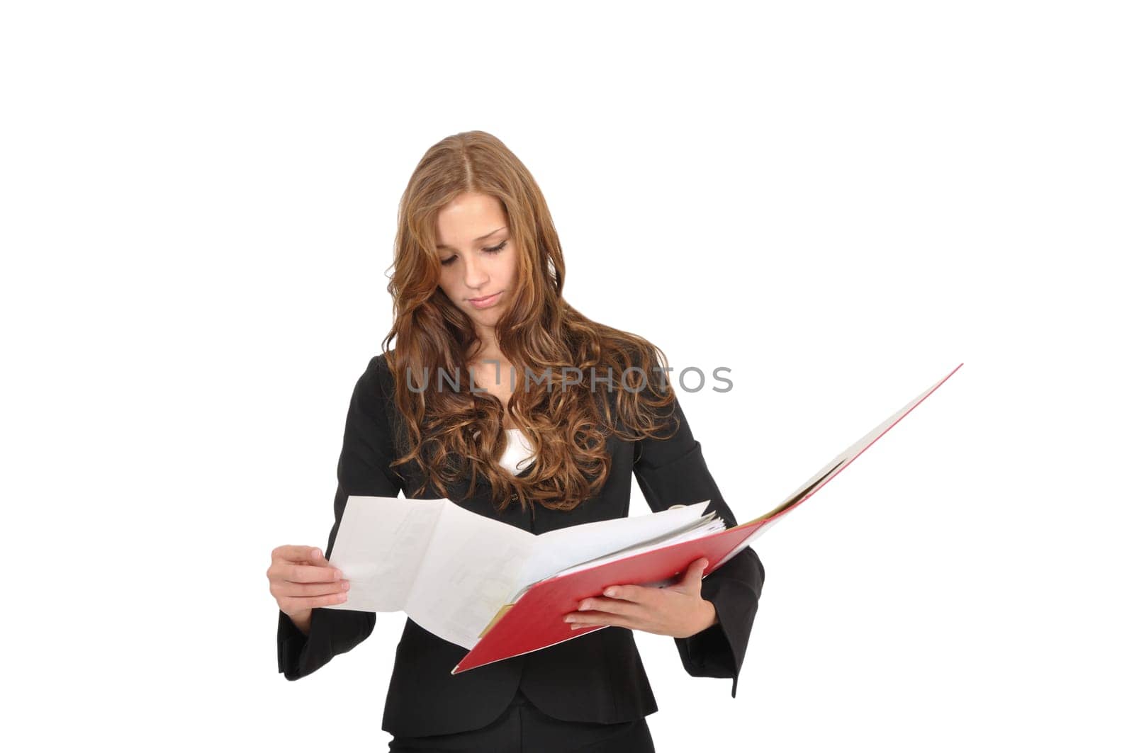 Young woman leafing through red folder