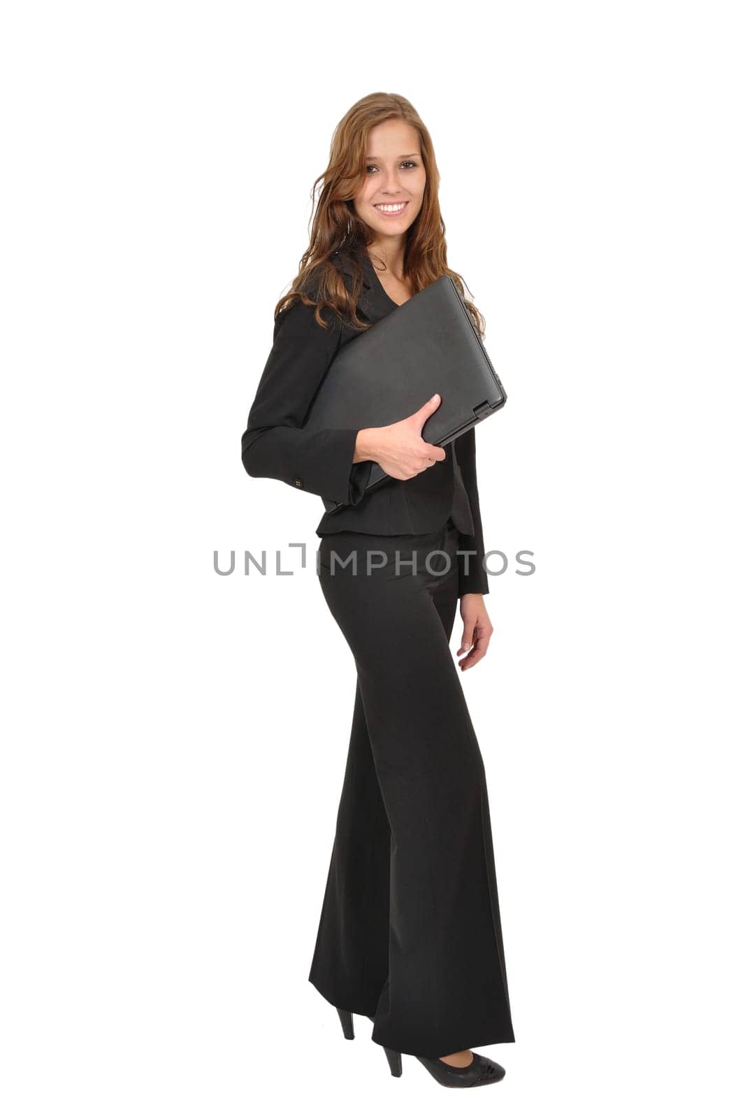 Businesswoman with suit and laptop sideways