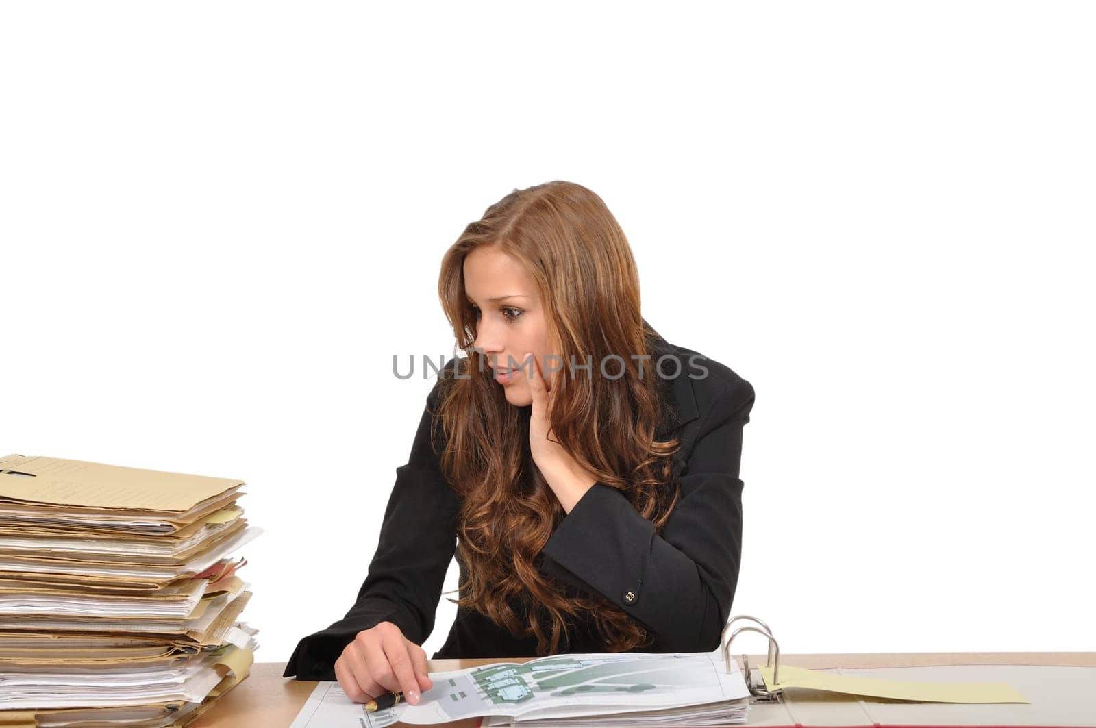 Businesswoman is surprised by the mountain of files