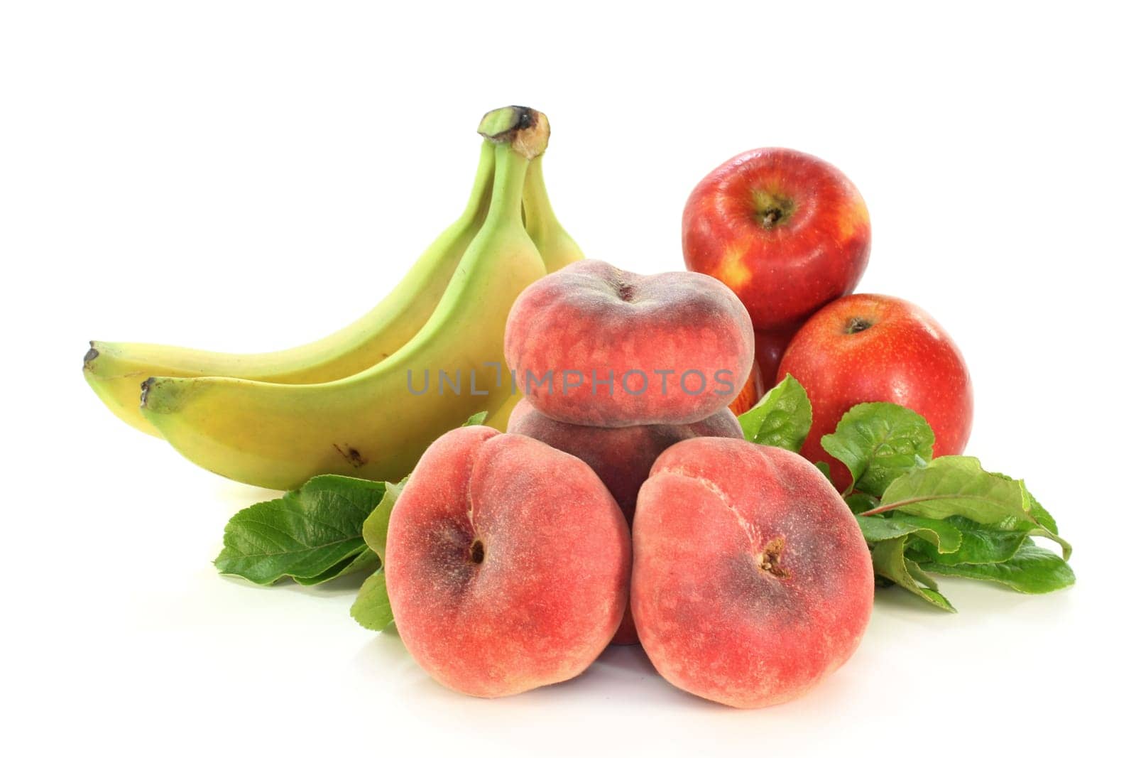 Different types of fruit against white background