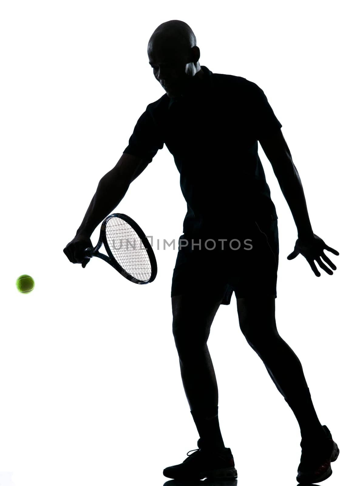 man african afro american playing tennis player backhand, on studio isolated on white background