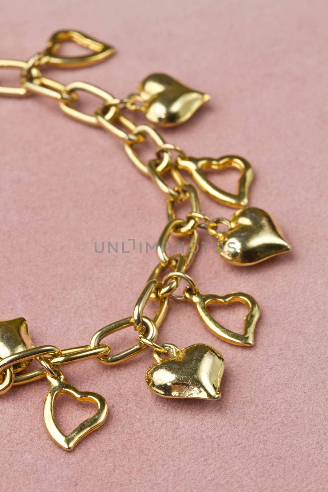 Nice golden bracelet in heart shape