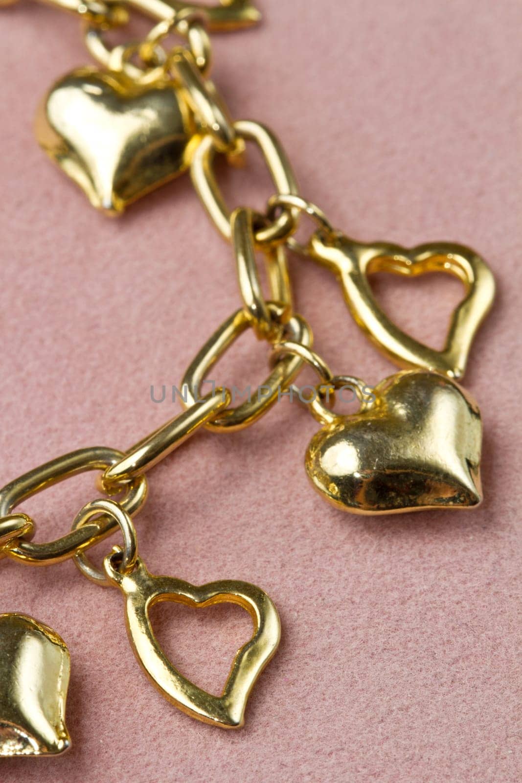 Nice golden bracelet in heart shape
