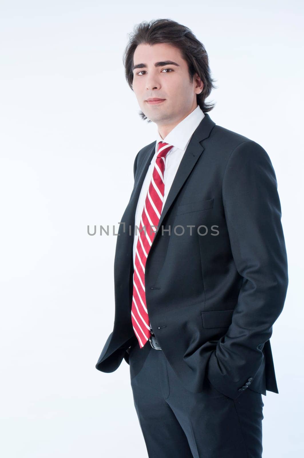 Confident young business man isolated on white background