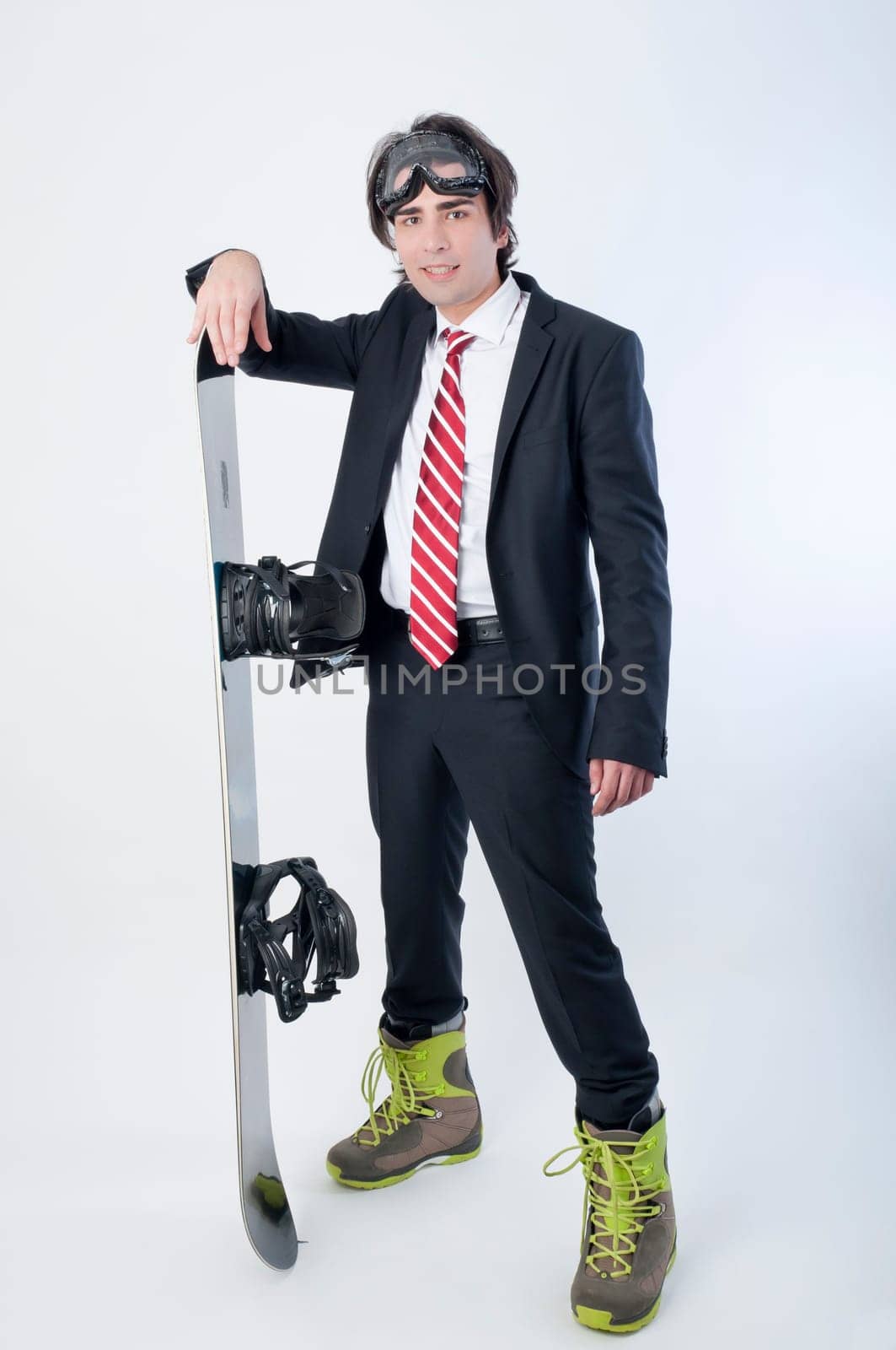 Young business man with a snowboarder