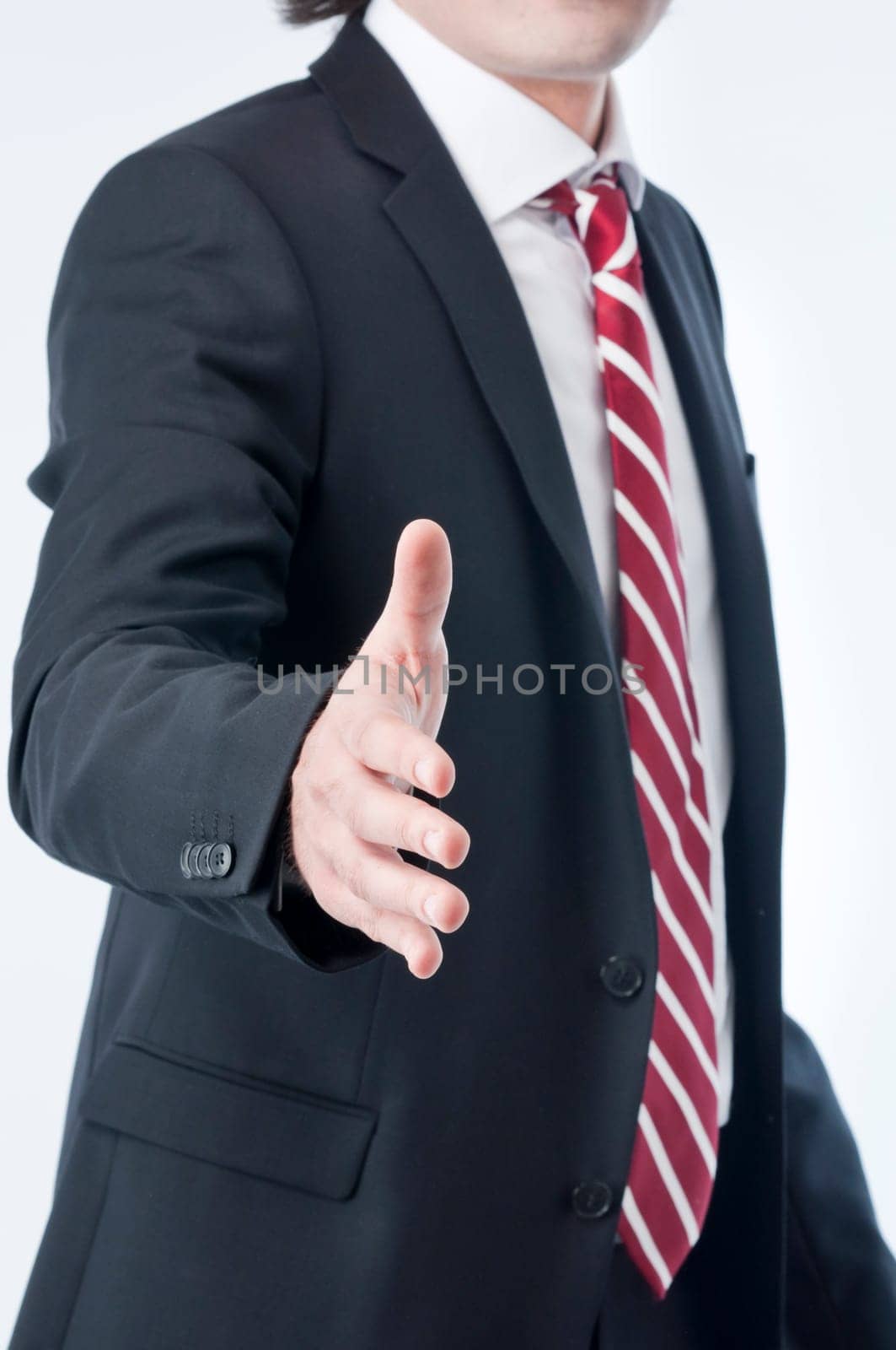 A business man with an open hand ready to seal a deal