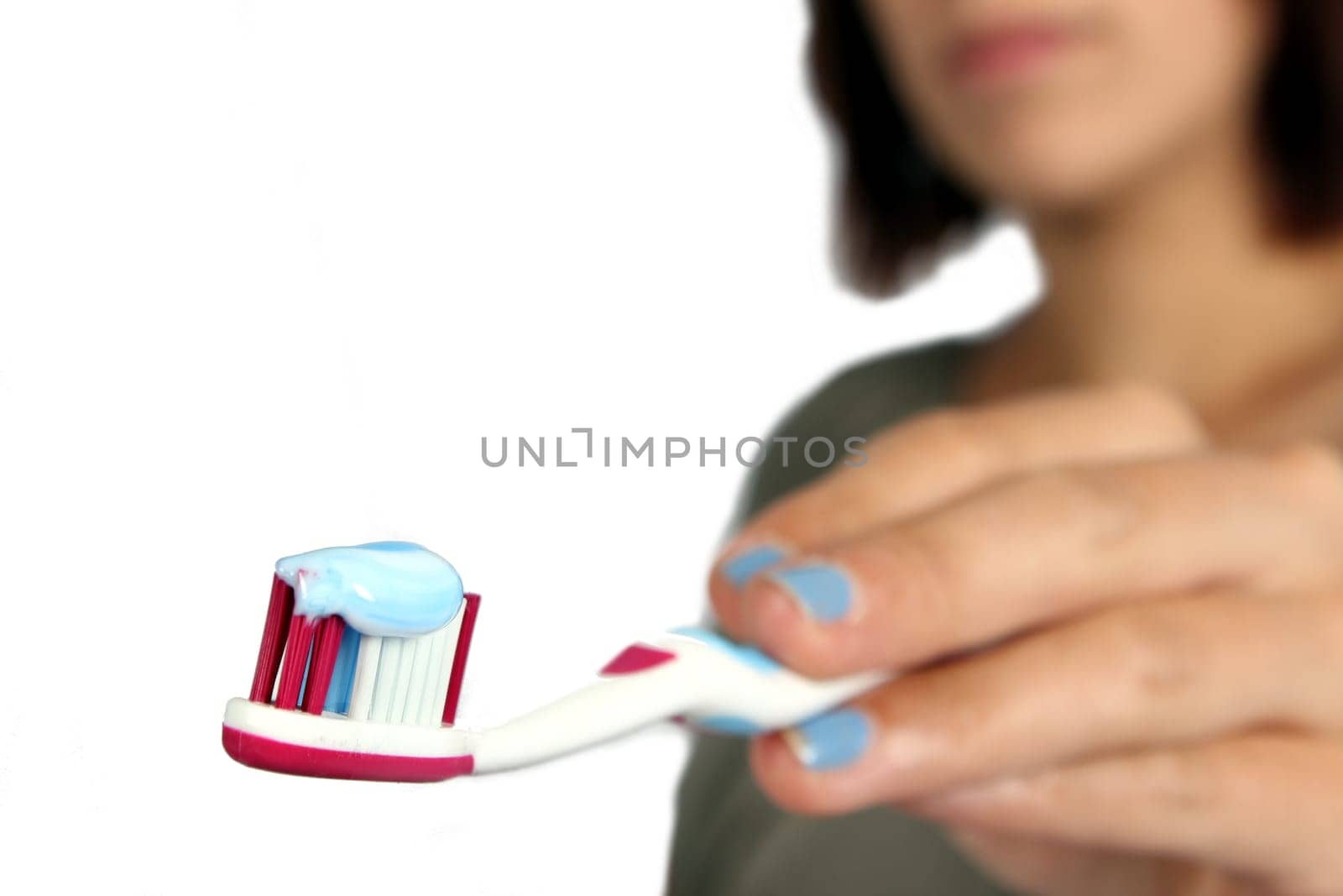 Girl with toothbrush