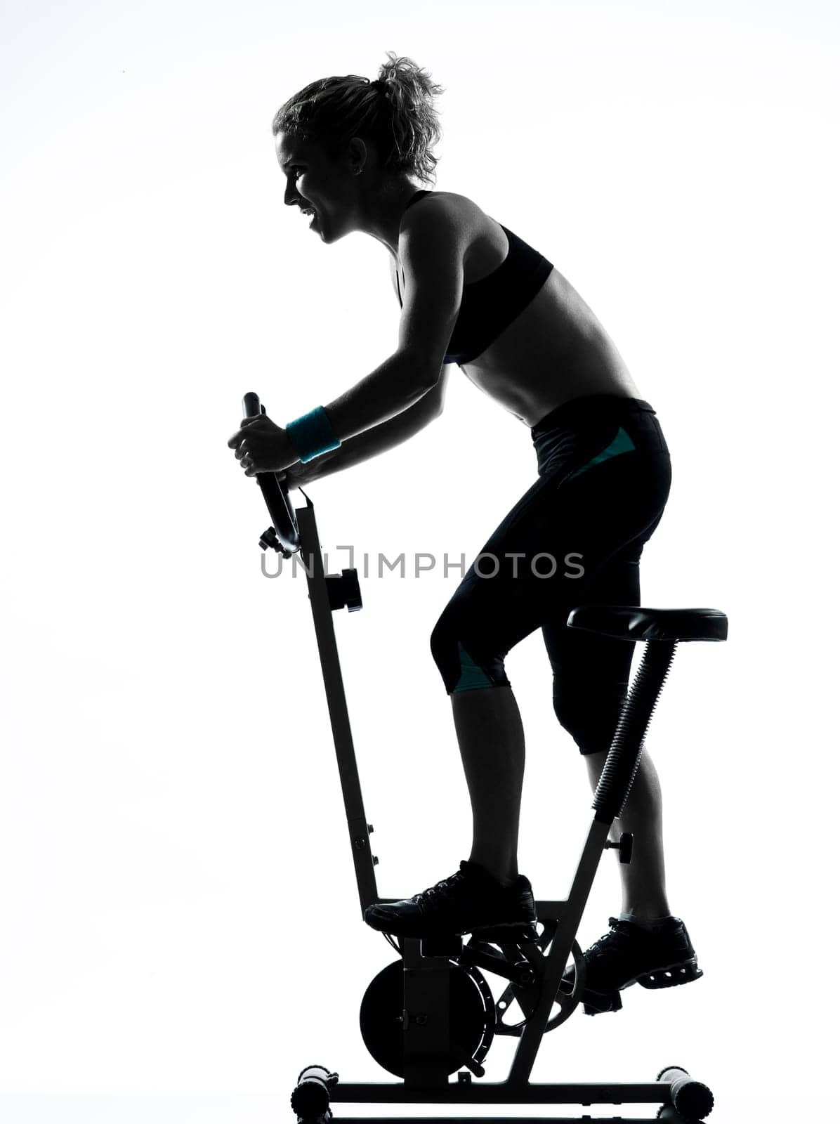 one woman biking exercising workout fitness aerobic exercise posture on studio isolated white background