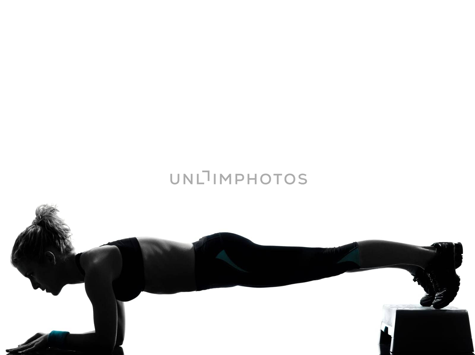 one woman exercising workout fitness aerobic exercise abdominals push ups posture on studio isolated white background