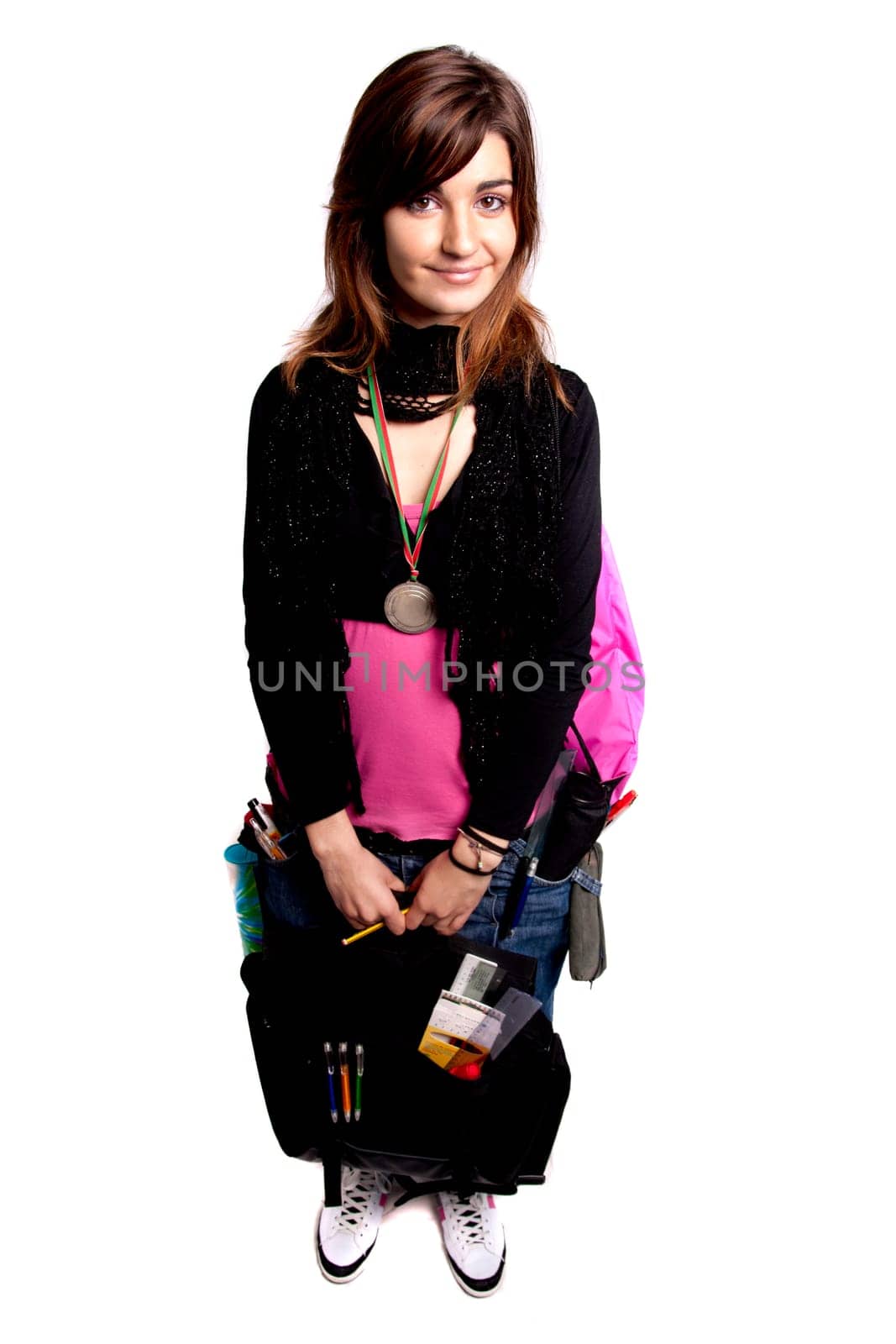 View of a teenager school girl with school stuff on a white background.