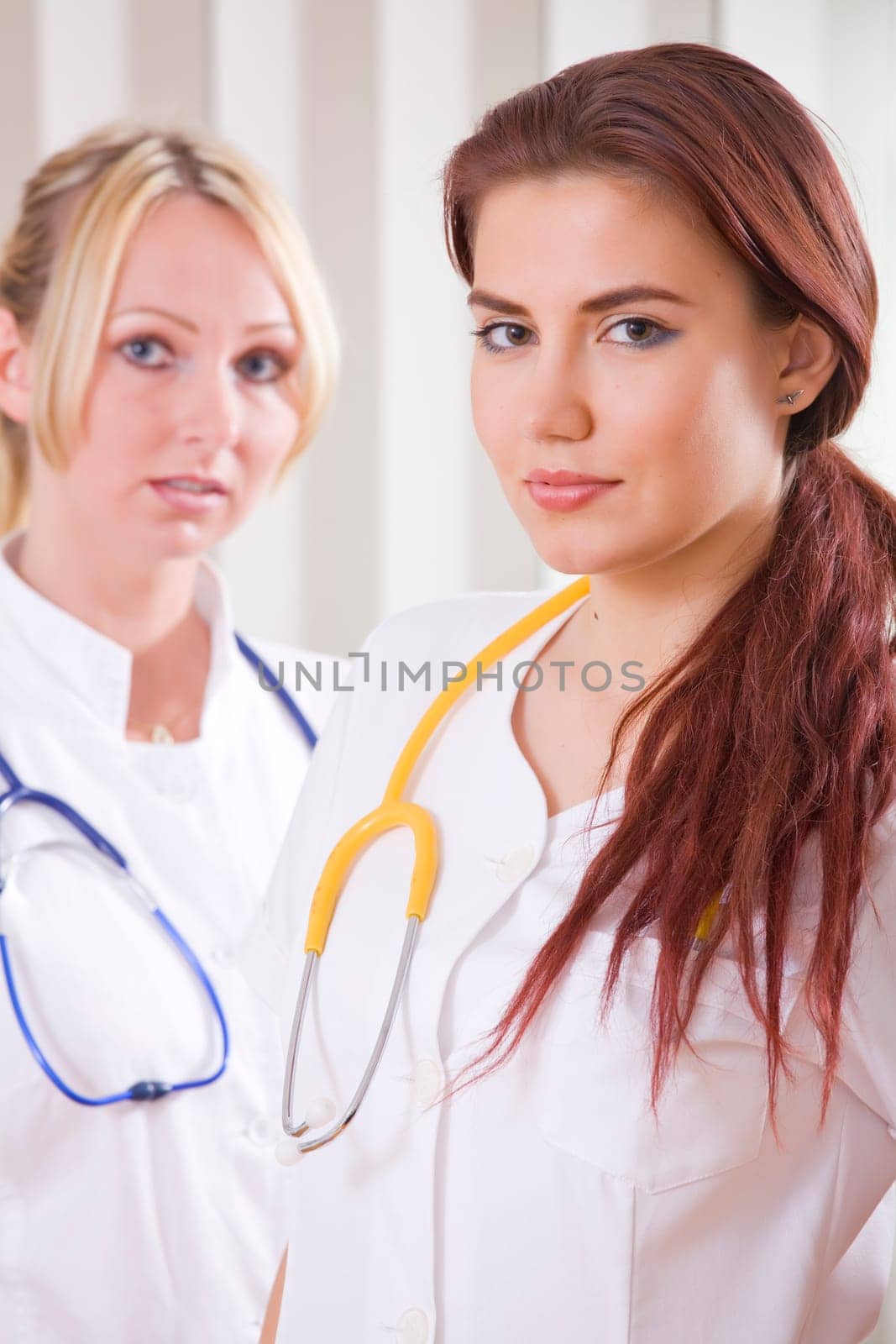 portrait of two women doctors in uniforms