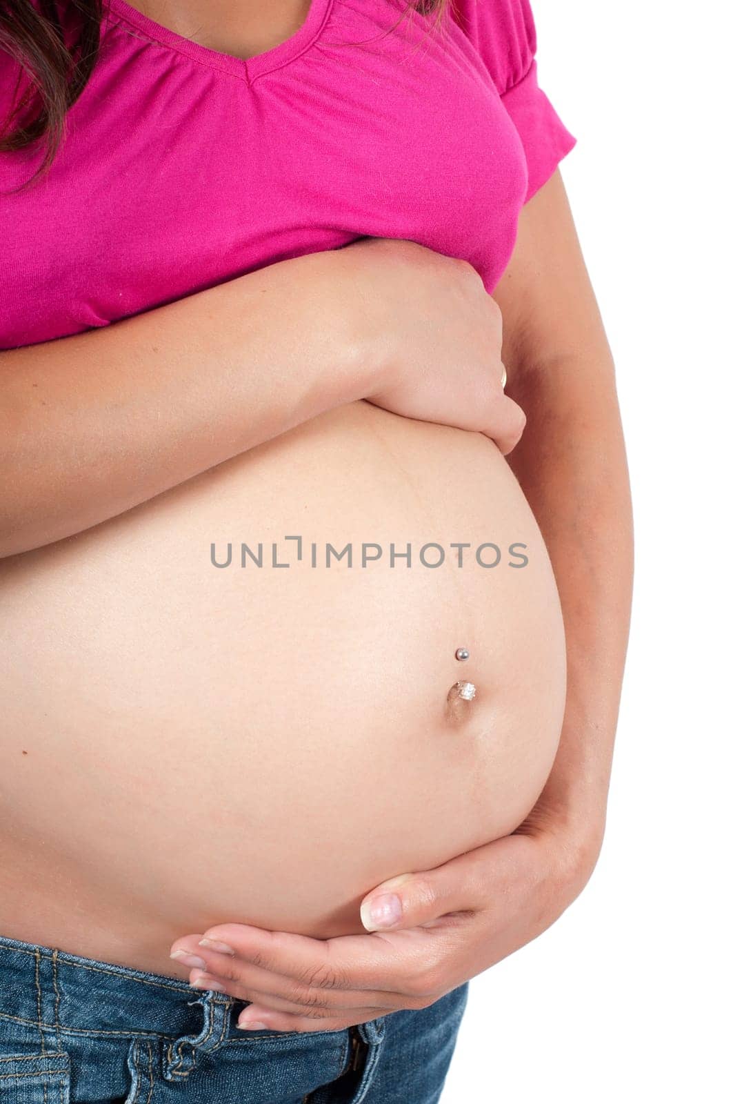 Beautiful pregnant woman in studio isolated on white