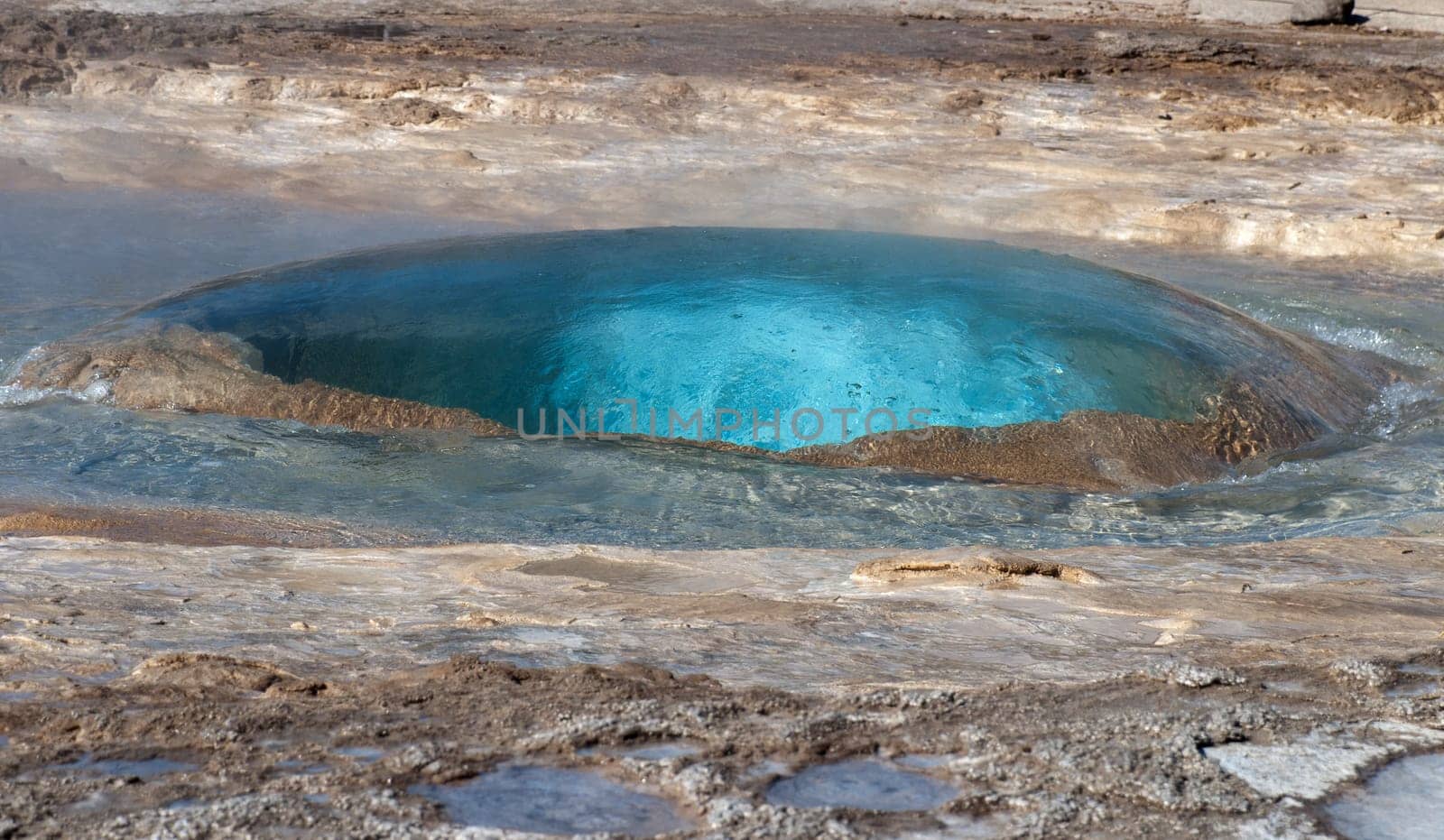 eruption beginning of a geyser in iceland