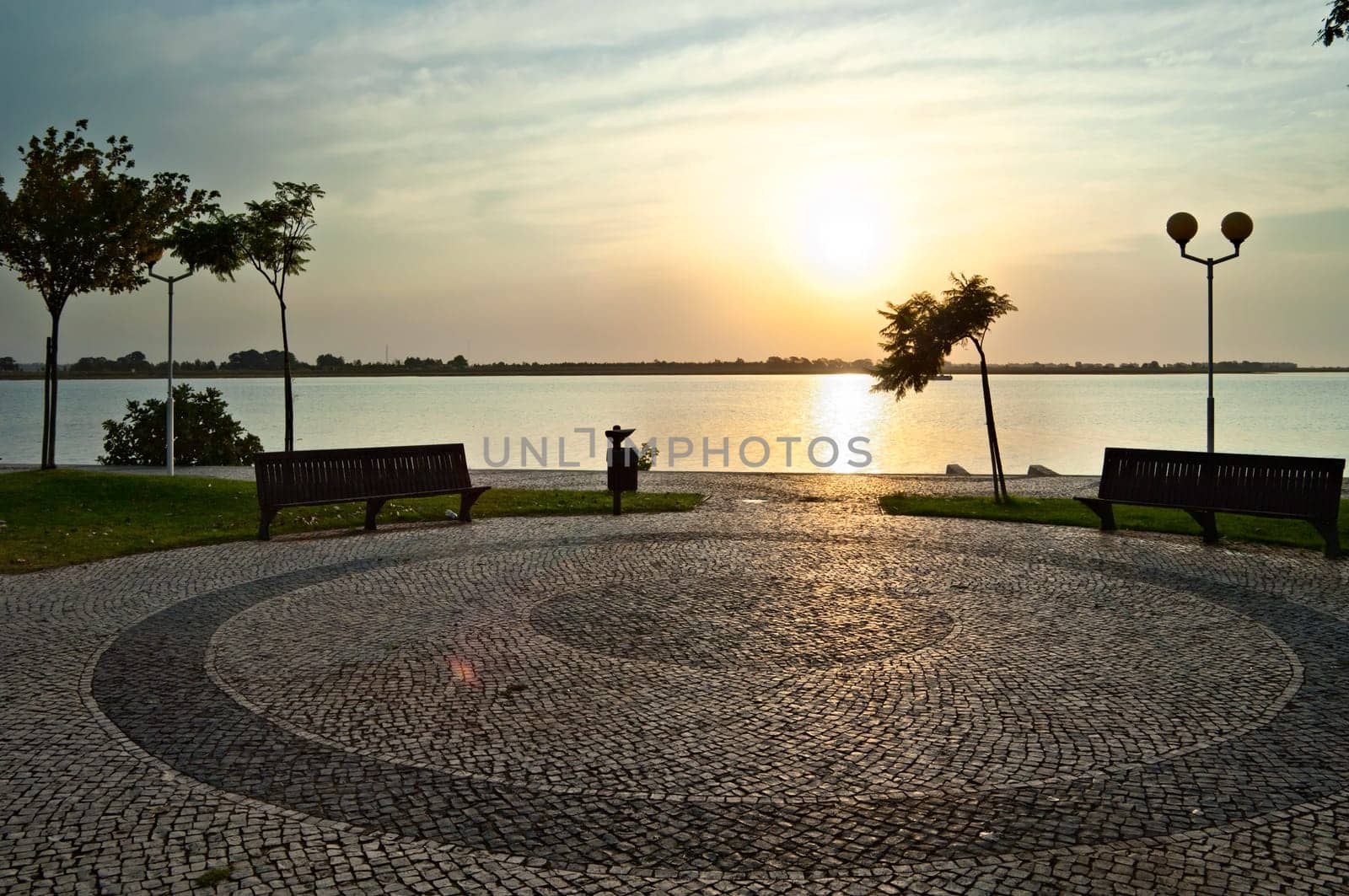 Sunrise over Guadiana river an the cobblestones of Vila Real de Santo António, Algarve, Portugal