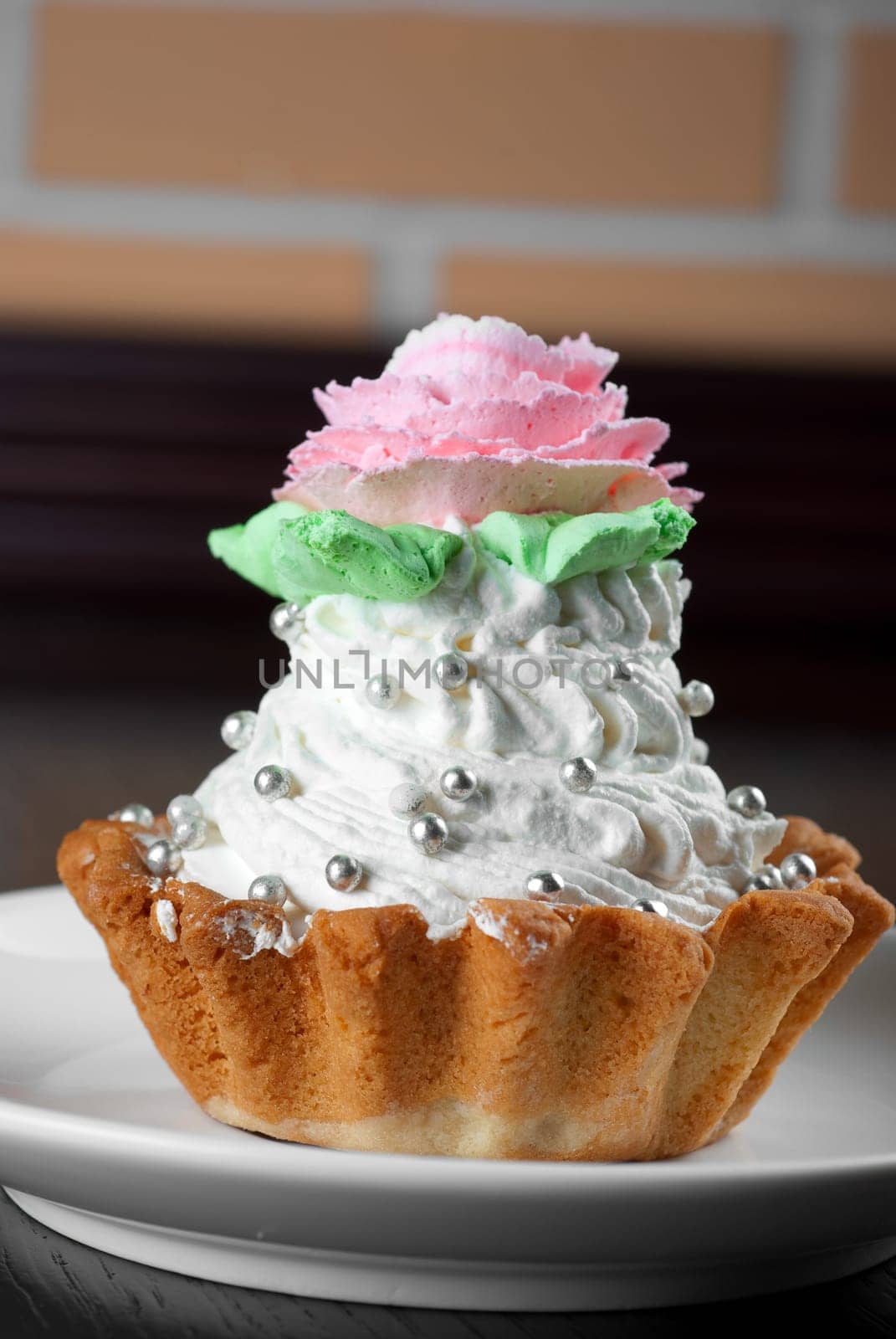 fresh baked cupcake on a wooden table