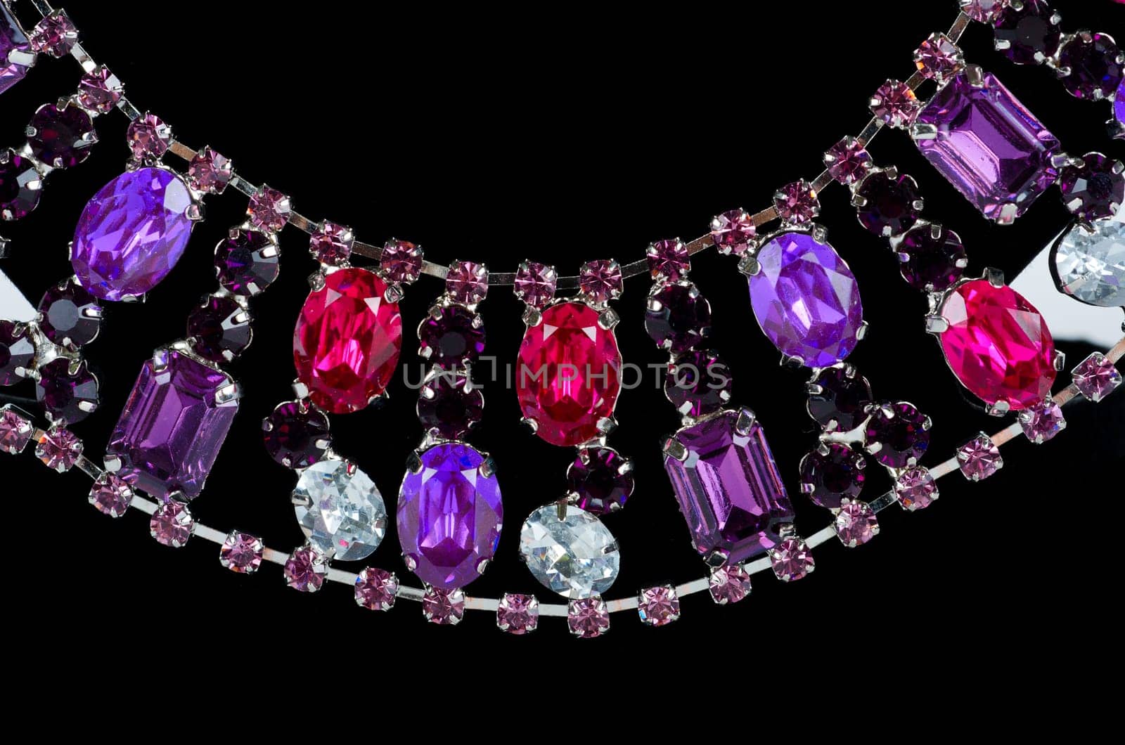 pendant closeup with big gem at black background