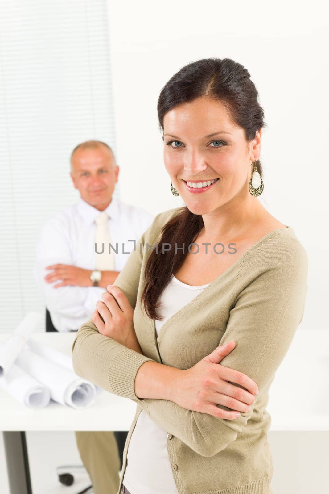 Professional architect woman attractive with blueprint in office