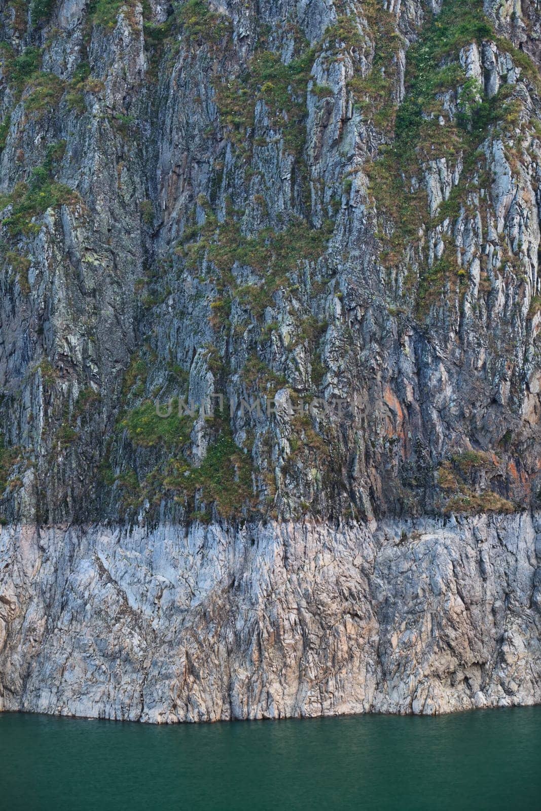 a high mountain slope on the lake