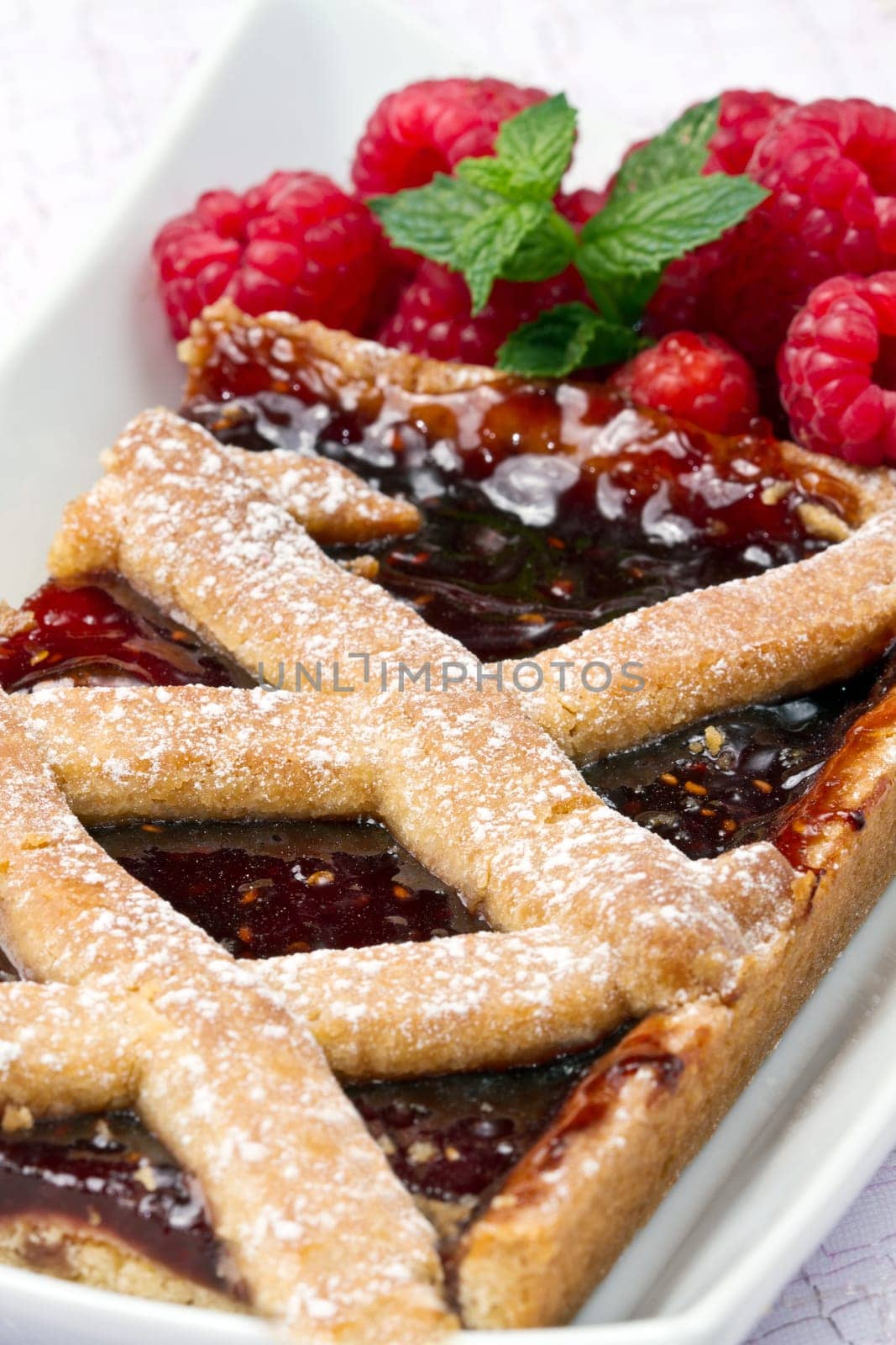a raspberries tart with fresh fruits