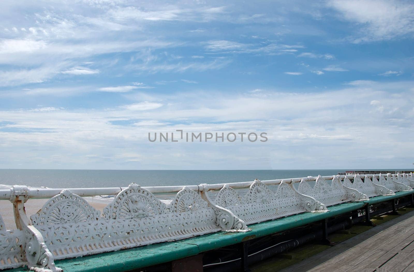Old Victorian Era Benches on an English Seaside Pier