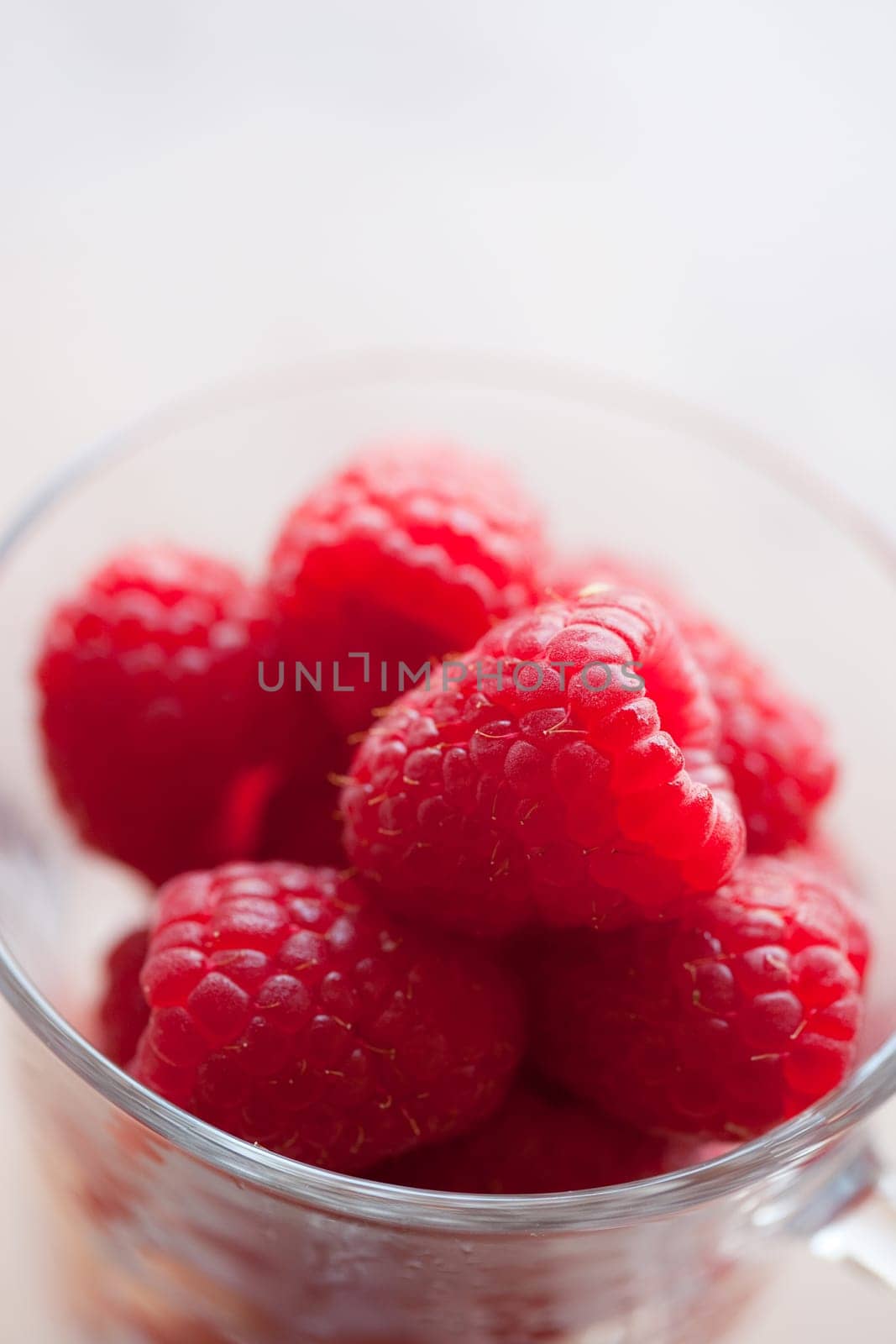 Close-up of delicious fresh raspberries. Studio shot.