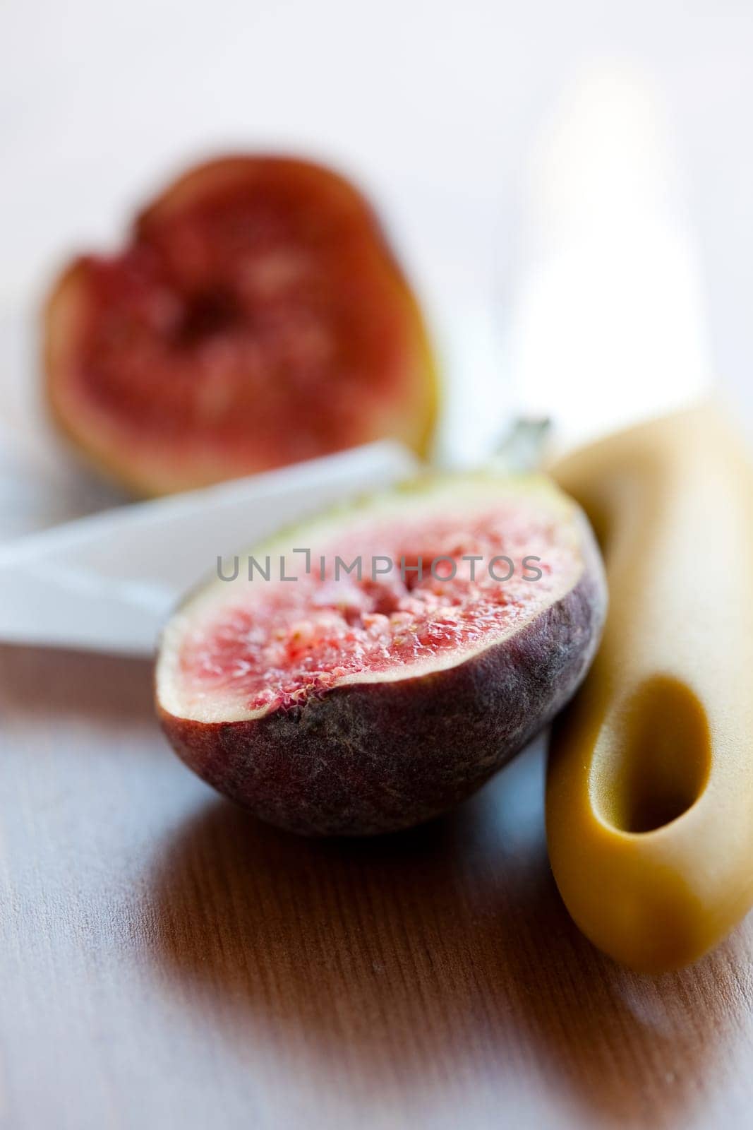 Delicious, fresh and ripe fig halves. Studio shot.