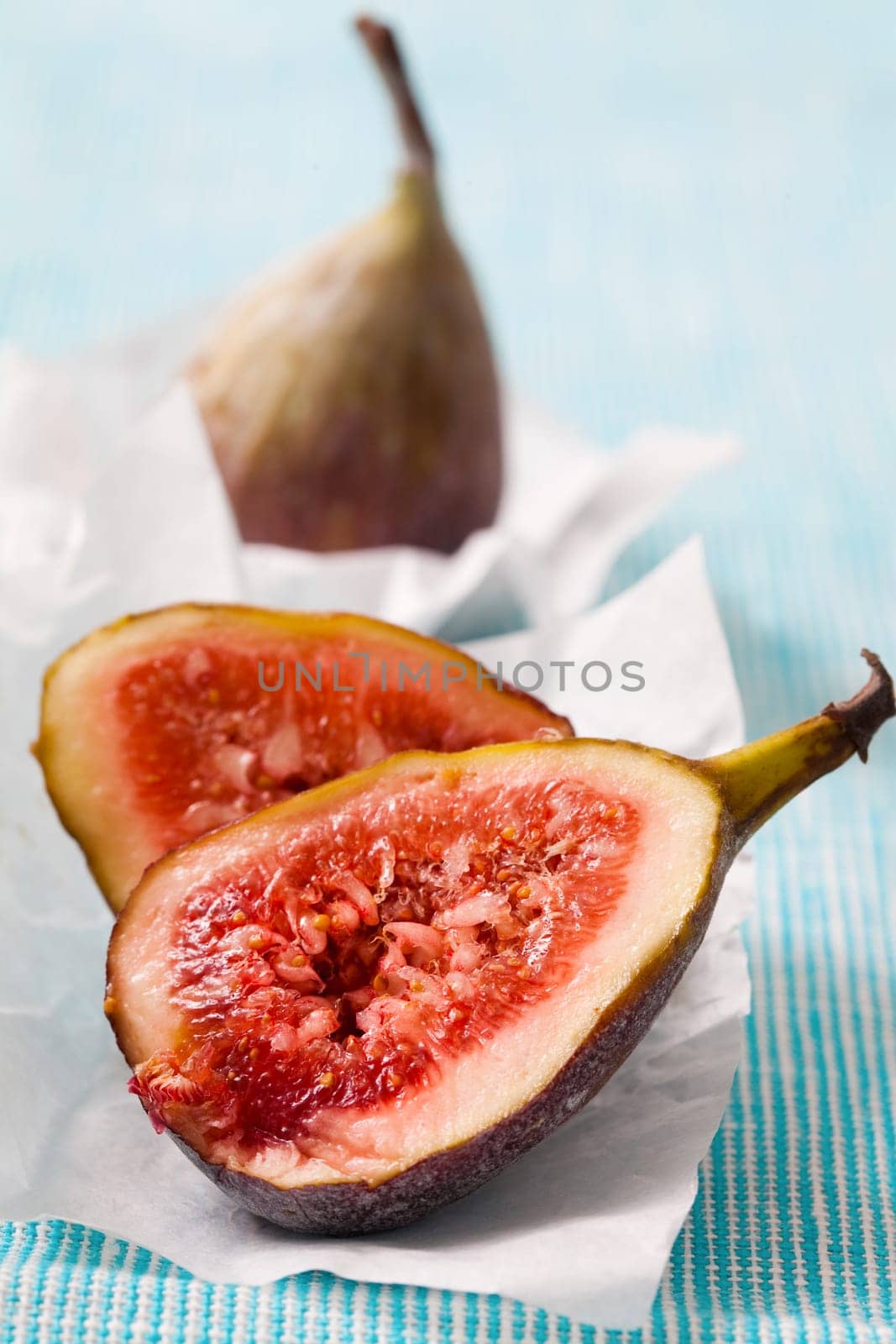 Delicious, fresh and ripe fig halves. Studio shot.
