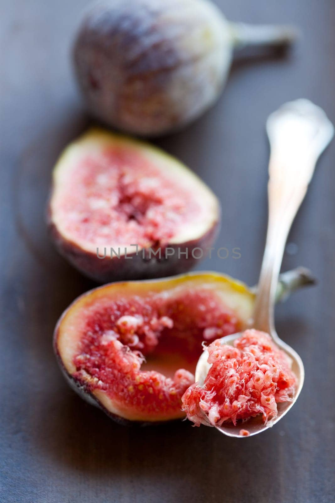 Delicious, fresh and ripe fig halves. Studio shot.