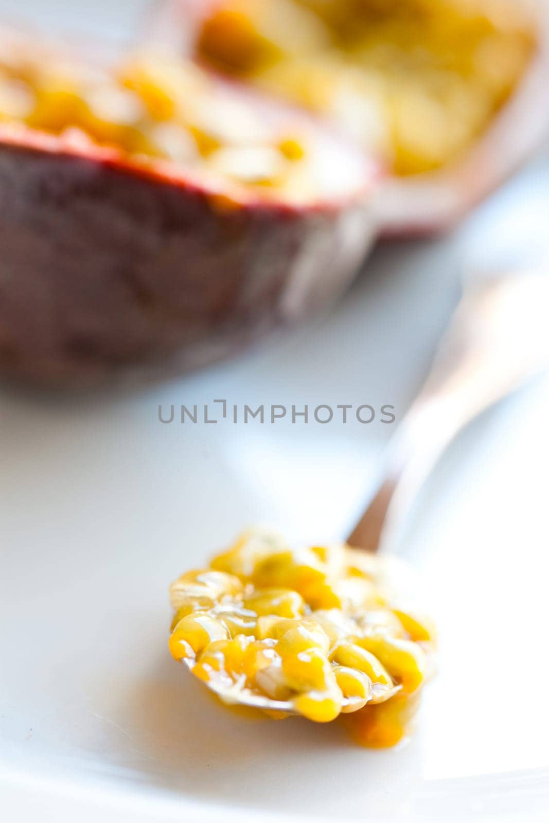 Delicious fresh passion fruit halves. Studio shot.